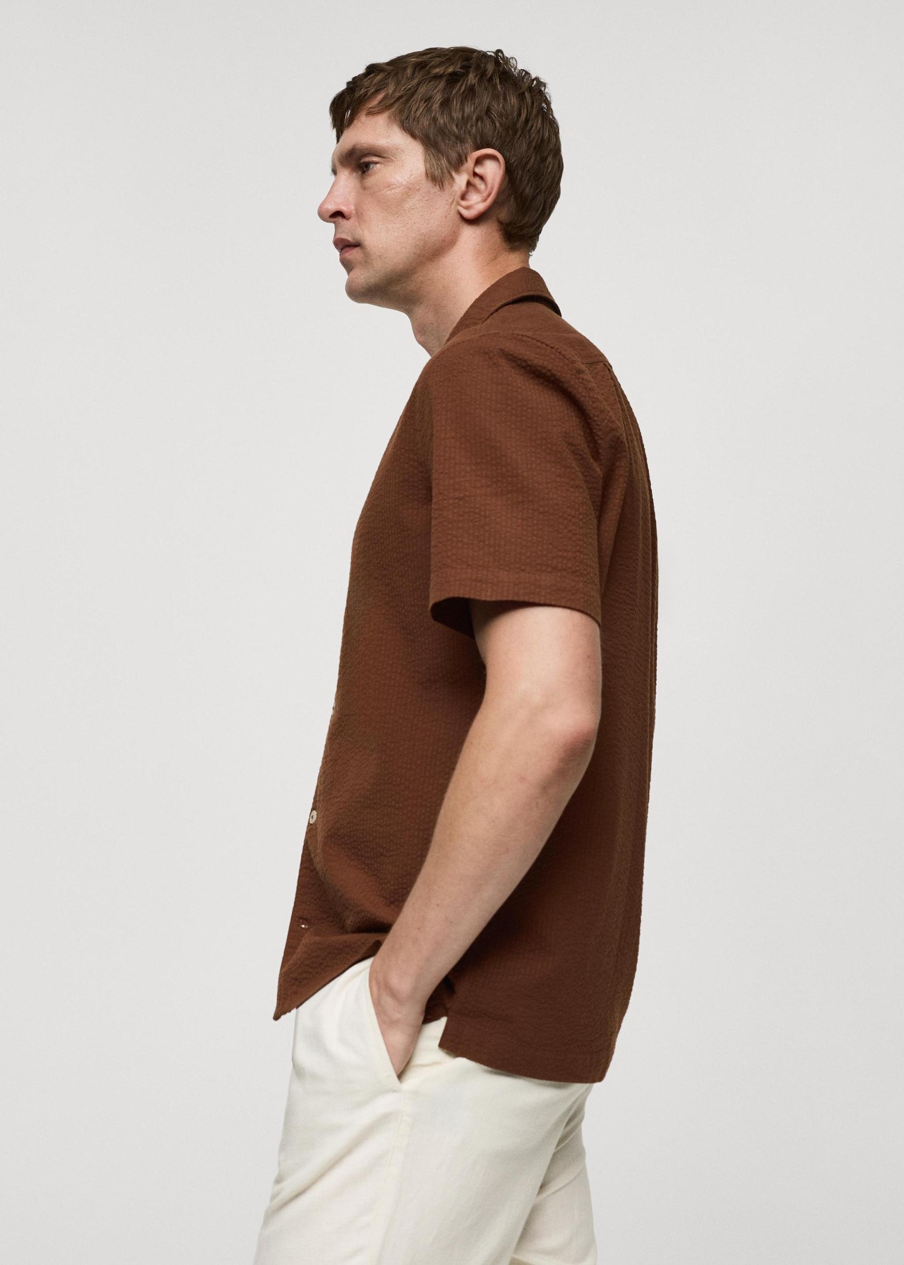 Regular-fit 100% seersucker cotton shirt - Men | MANGO USA Product Image