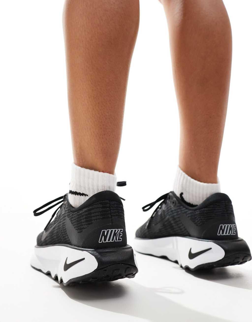 Nike Training Motiva sneakers in black and white Product Image
