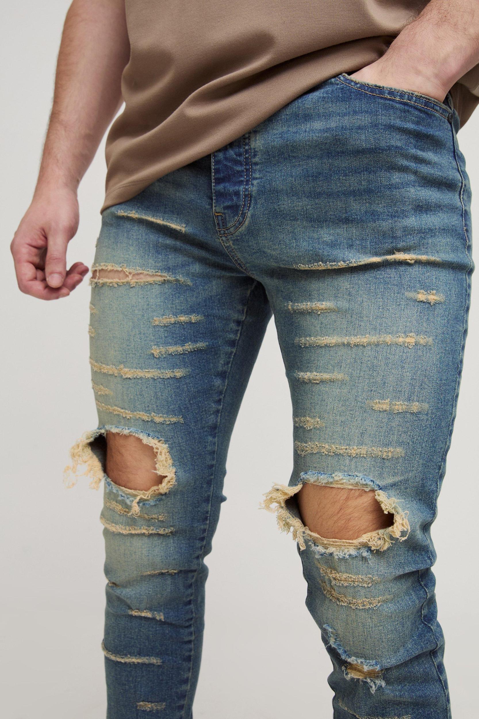 Tall Extreme Rip Busted Knee Skinny Jeans | boohooMAN USA Product Image