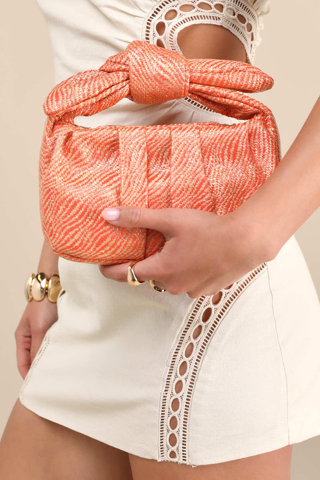 Essential Style Orange Striped Woven Knot Handle Clutch Bag Product Image