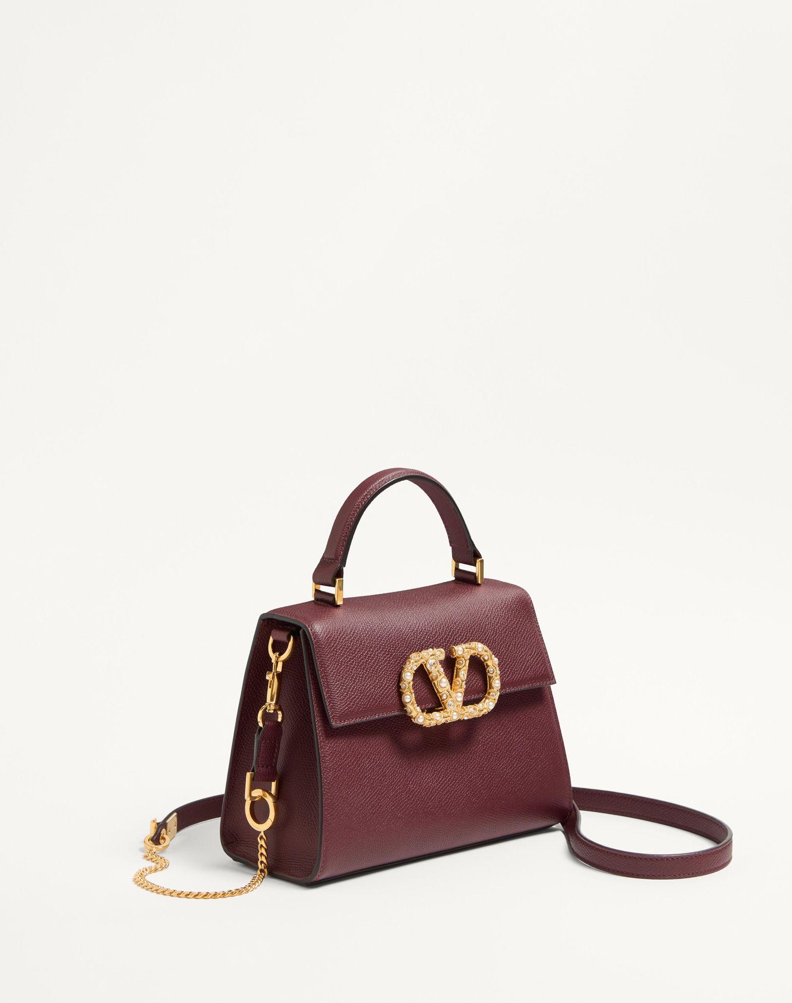 Valentino Garavani Vsling Small Handbag In Grainy Calfskin With Jewel Logo Product Image