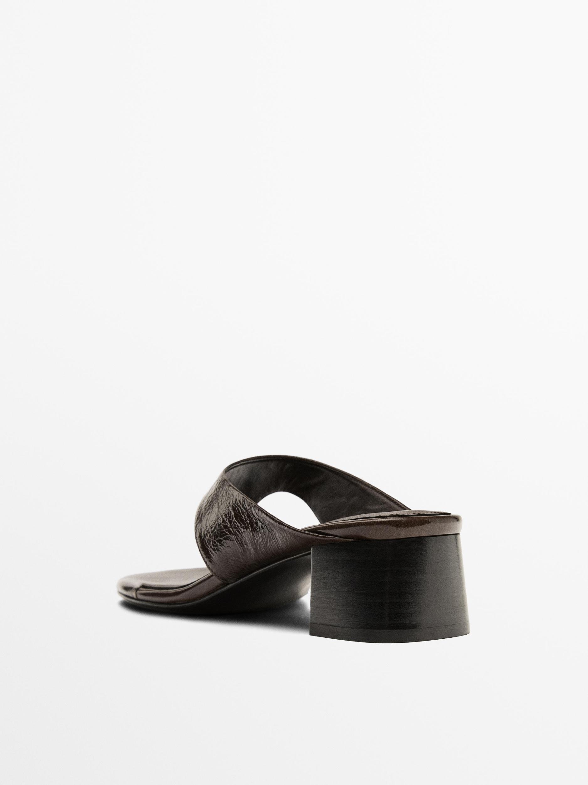 Heeled sandals with toe divider Product Image