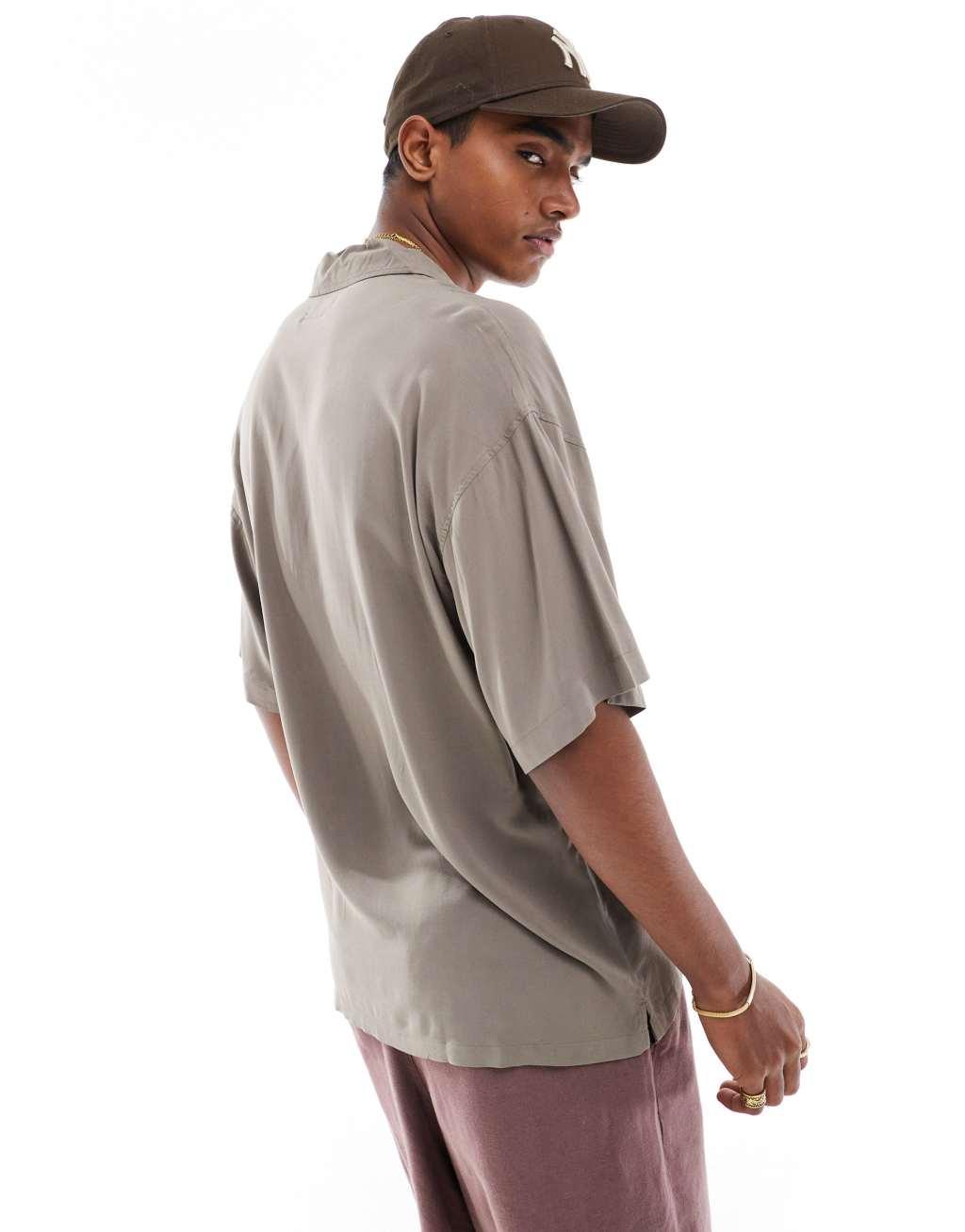 ADPT oversized revere collar shirt in beige Product Image
