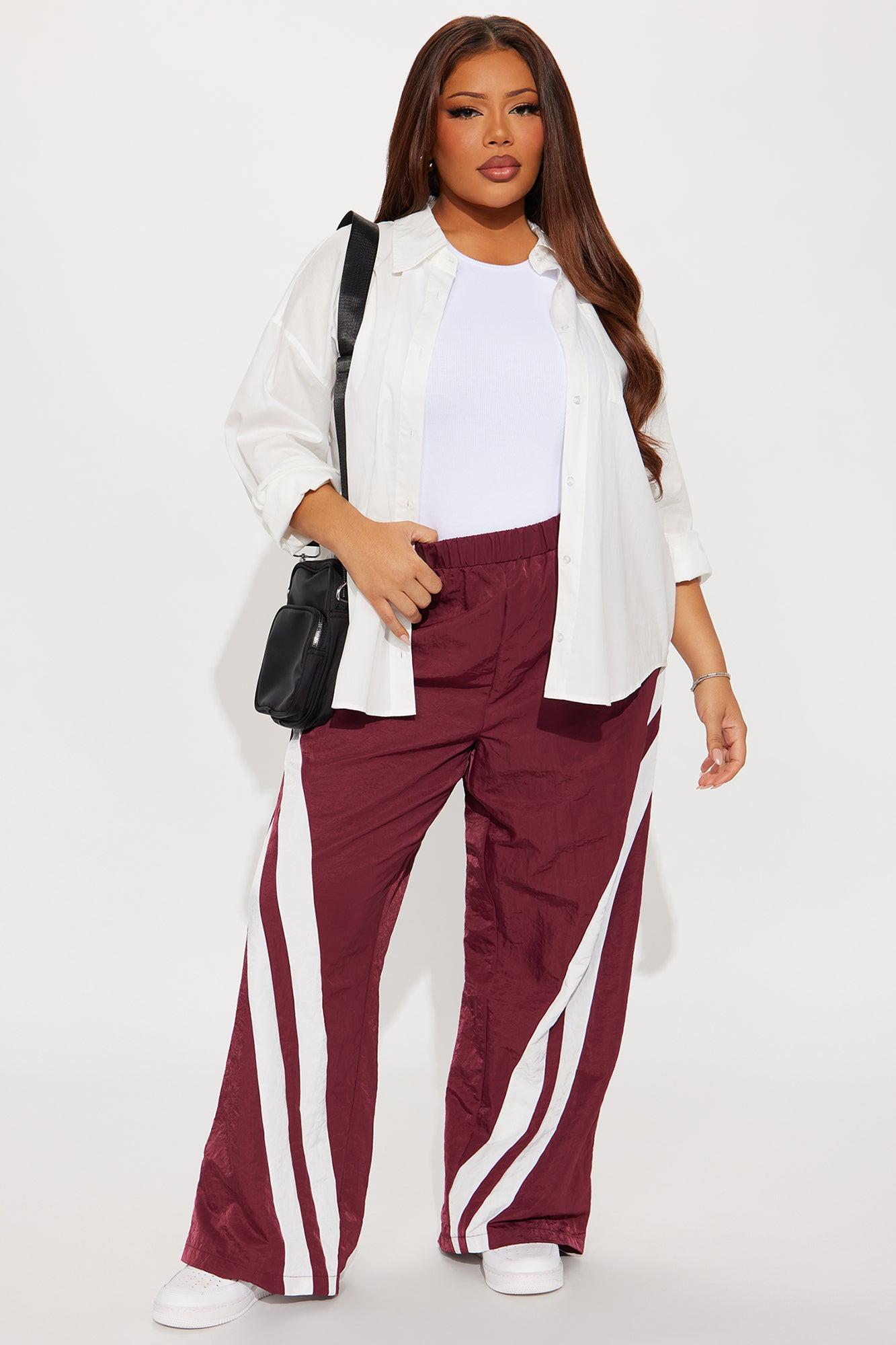 Follow The Curve Windbreaker Track Pant - Burgundy Female Product Image