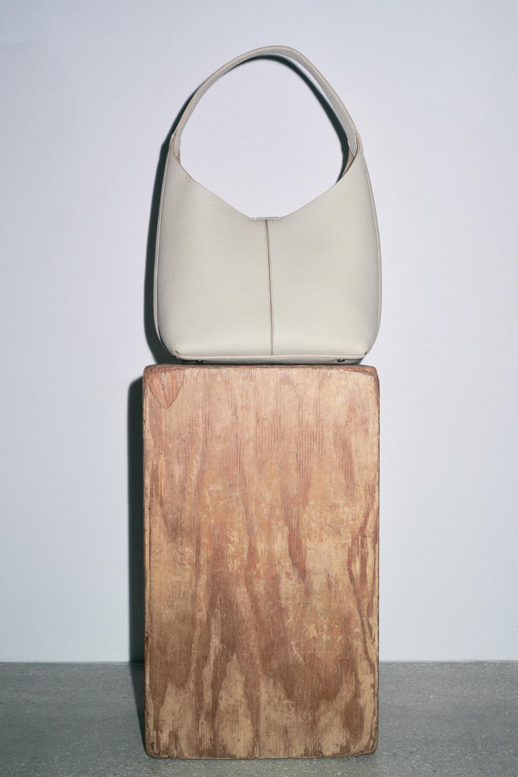 GRAINED LEATHER BUCKET BAG Product Image