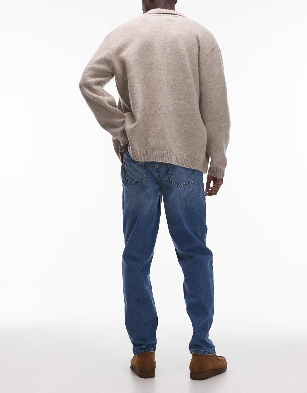 Topman stretch tapered jeans in mid wash blue Product Image