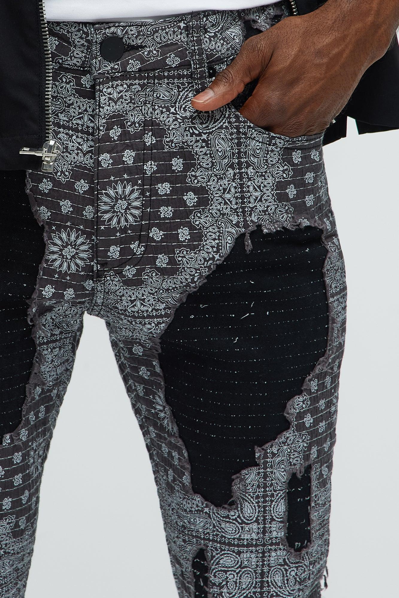 Shredded Shock Distressed Stacked Skinny Flare Jeans - Black Product Image