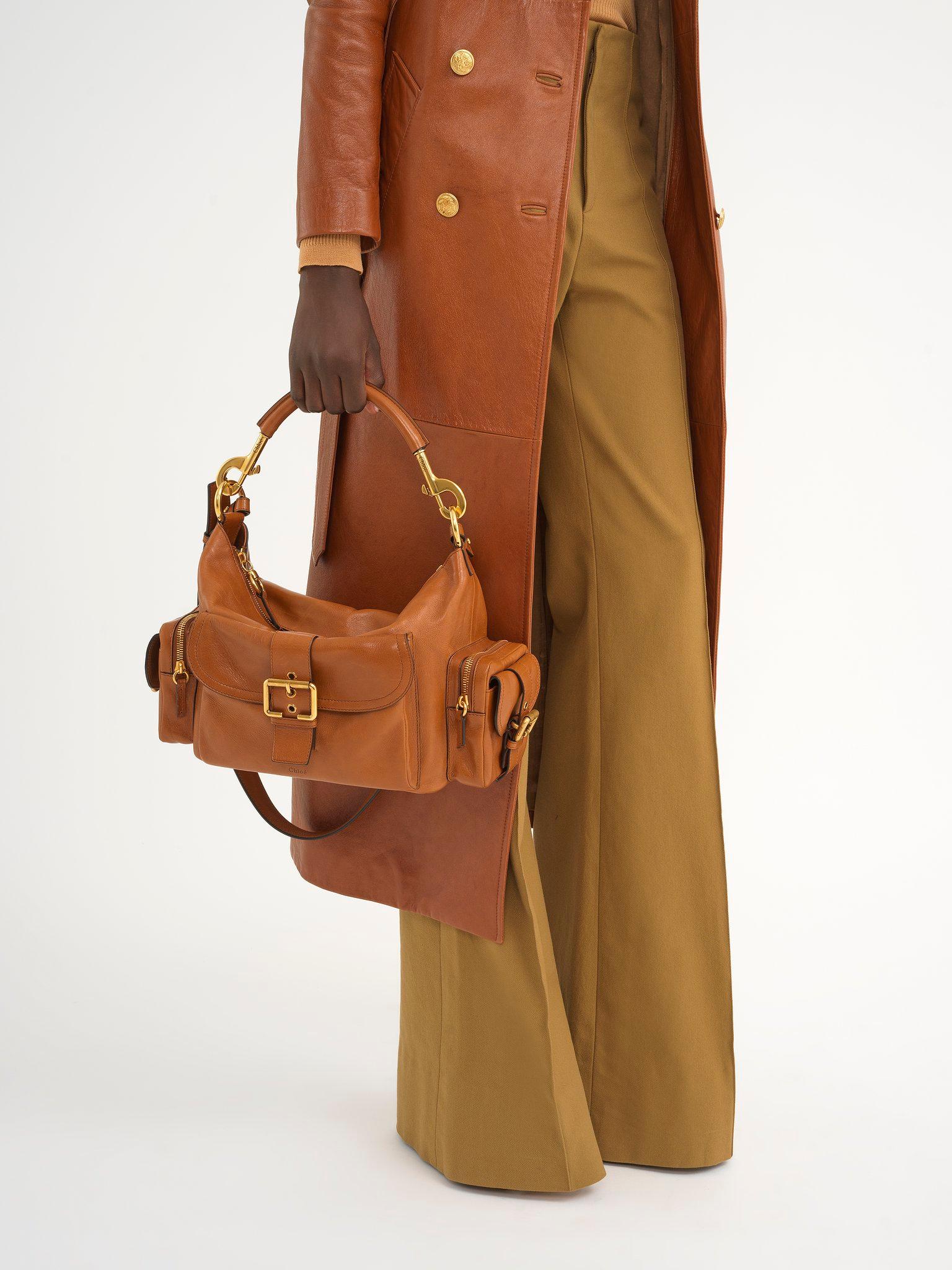 Camera bag in shiny leather Product Image