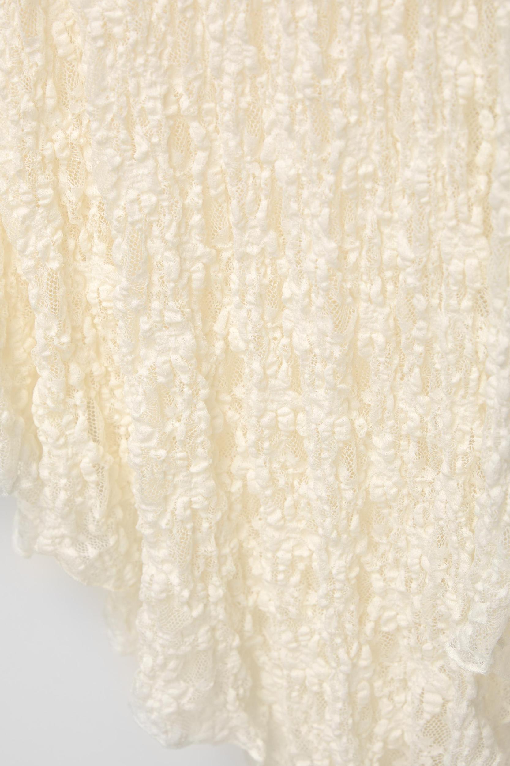 Asymmetric lace midi skirt Product Image