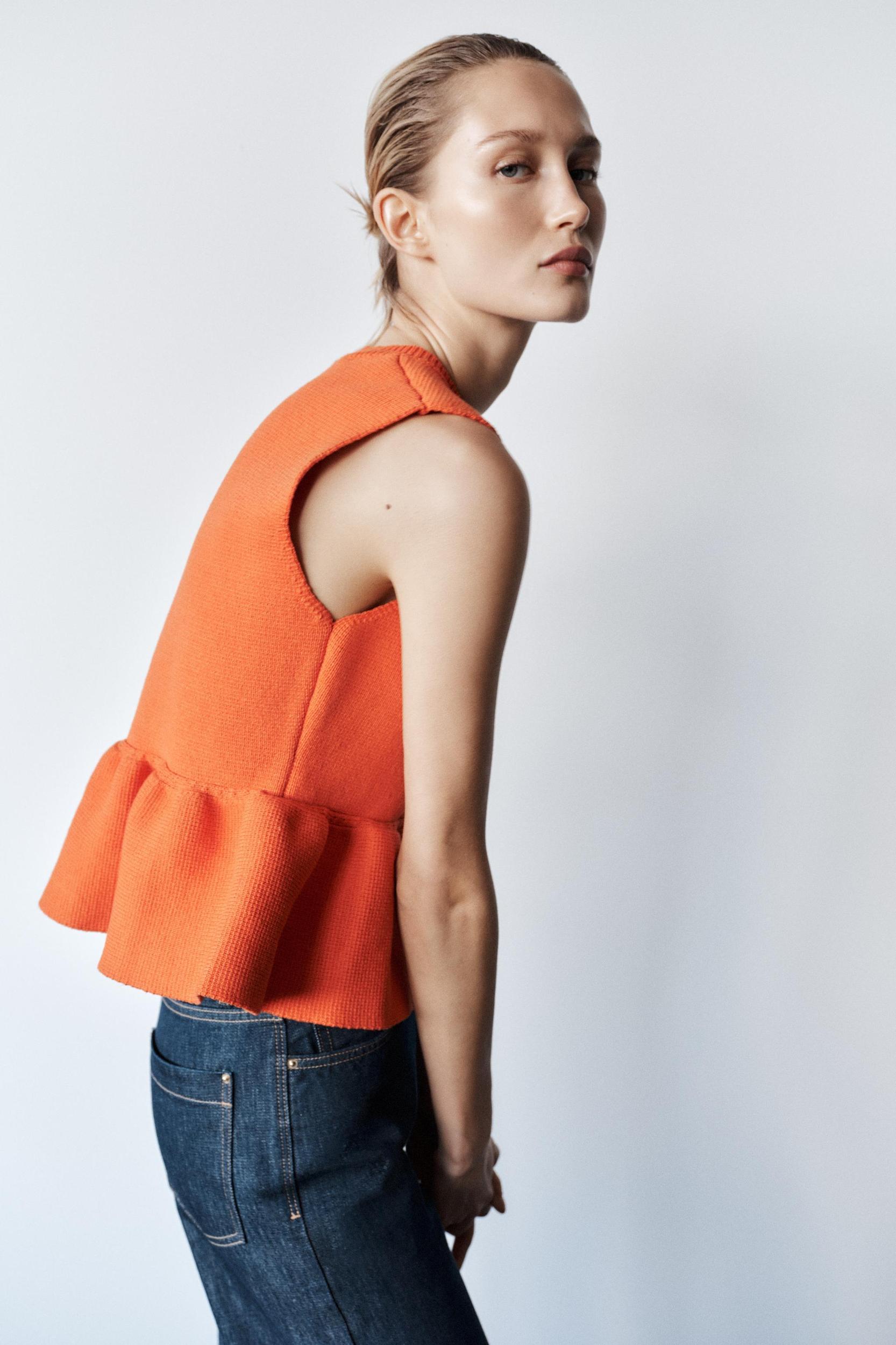 KNIT PEPLUM TOP Product Image