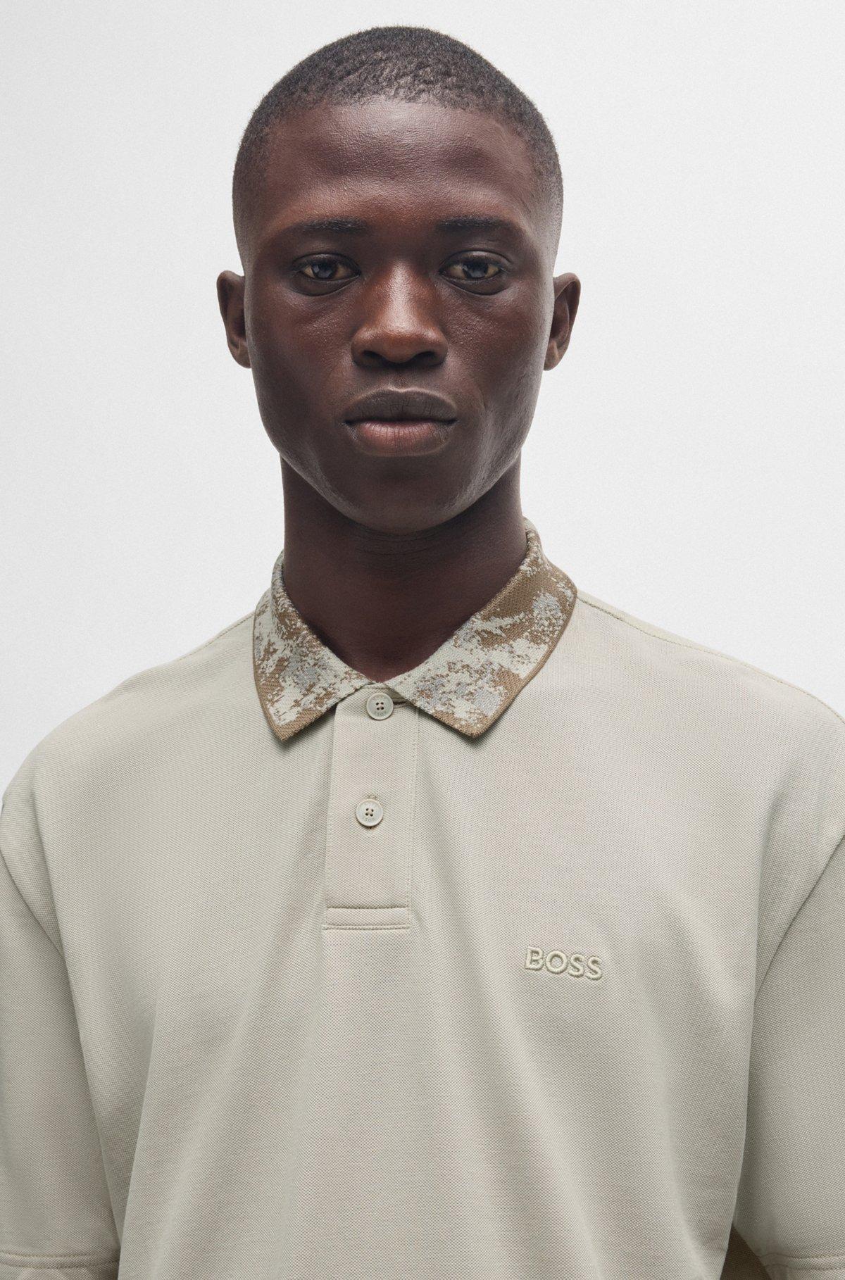 Cotton-piqué polo shirt with jungle-artwork collar Product Image
