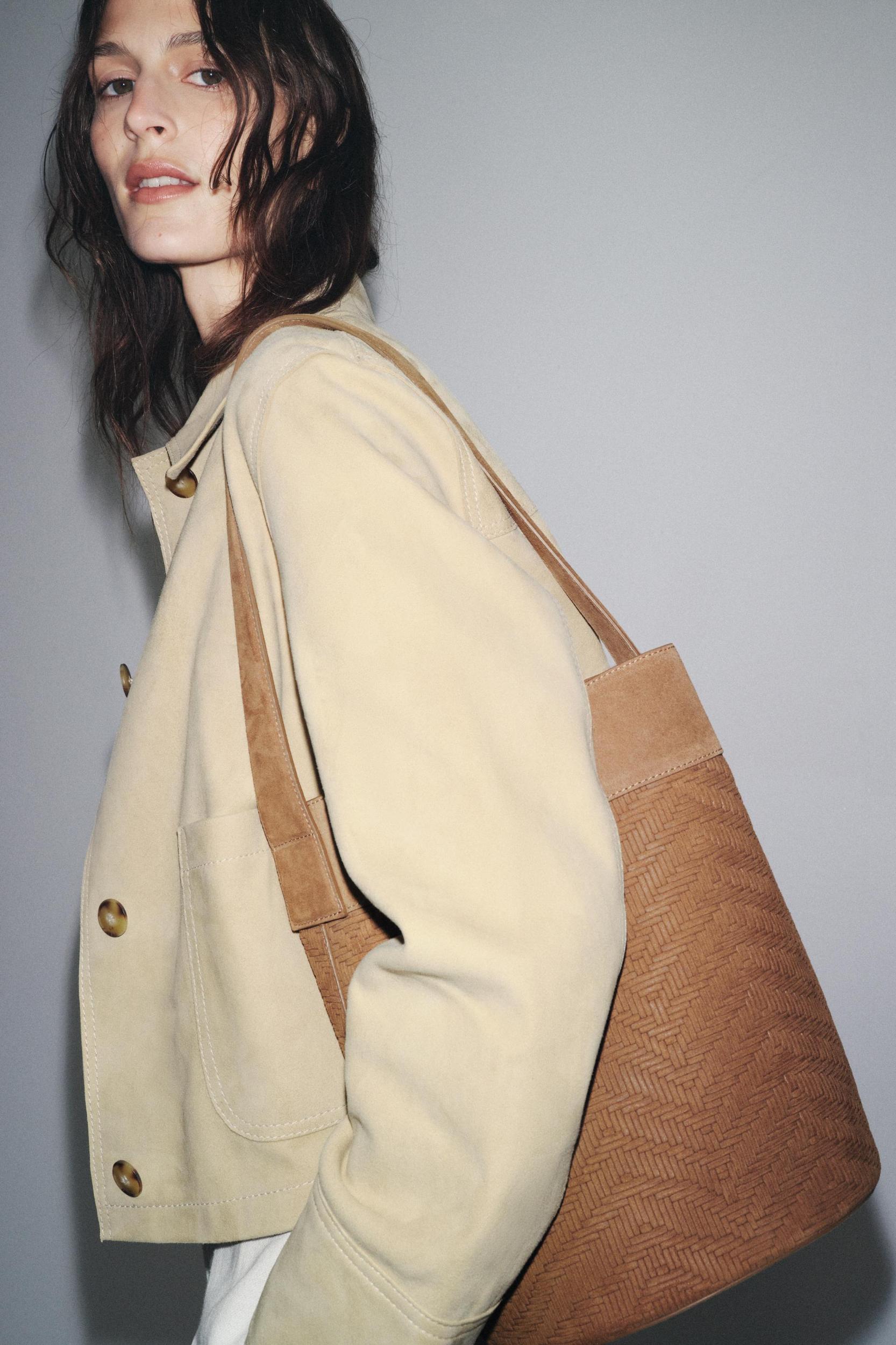 LEATHER BRAIDED MAXI BUCKET BAG Product Image