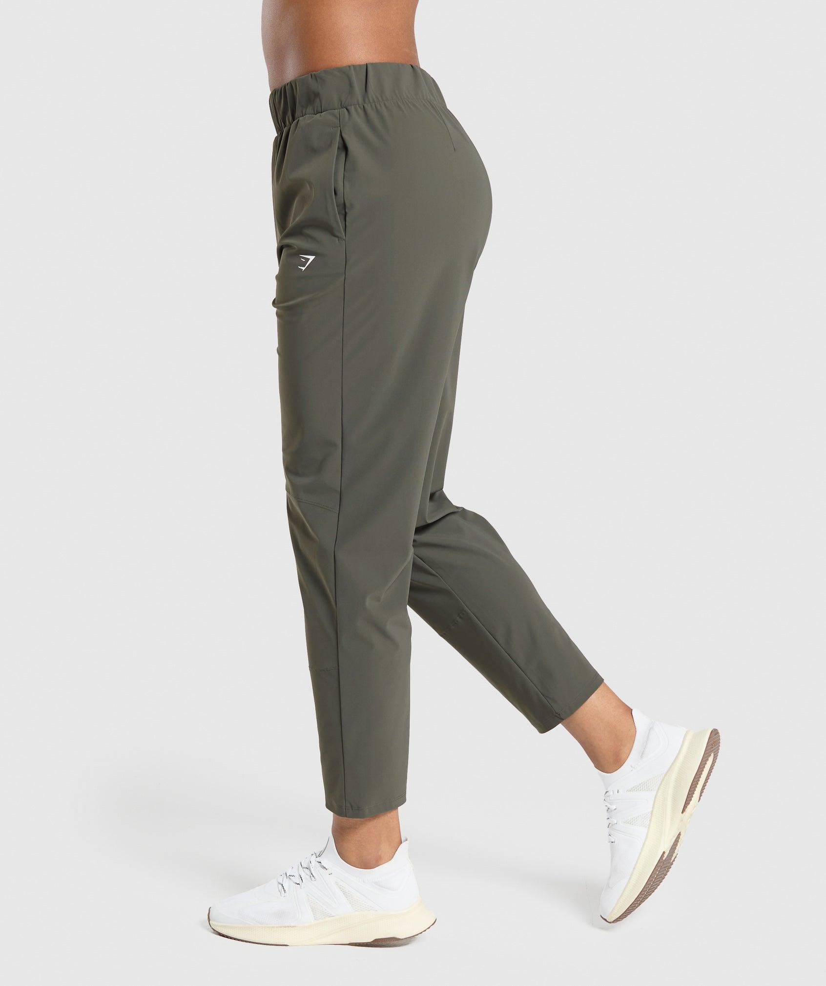 Gymshark Tapered Woven Pants - Strength Green Female Product Image
