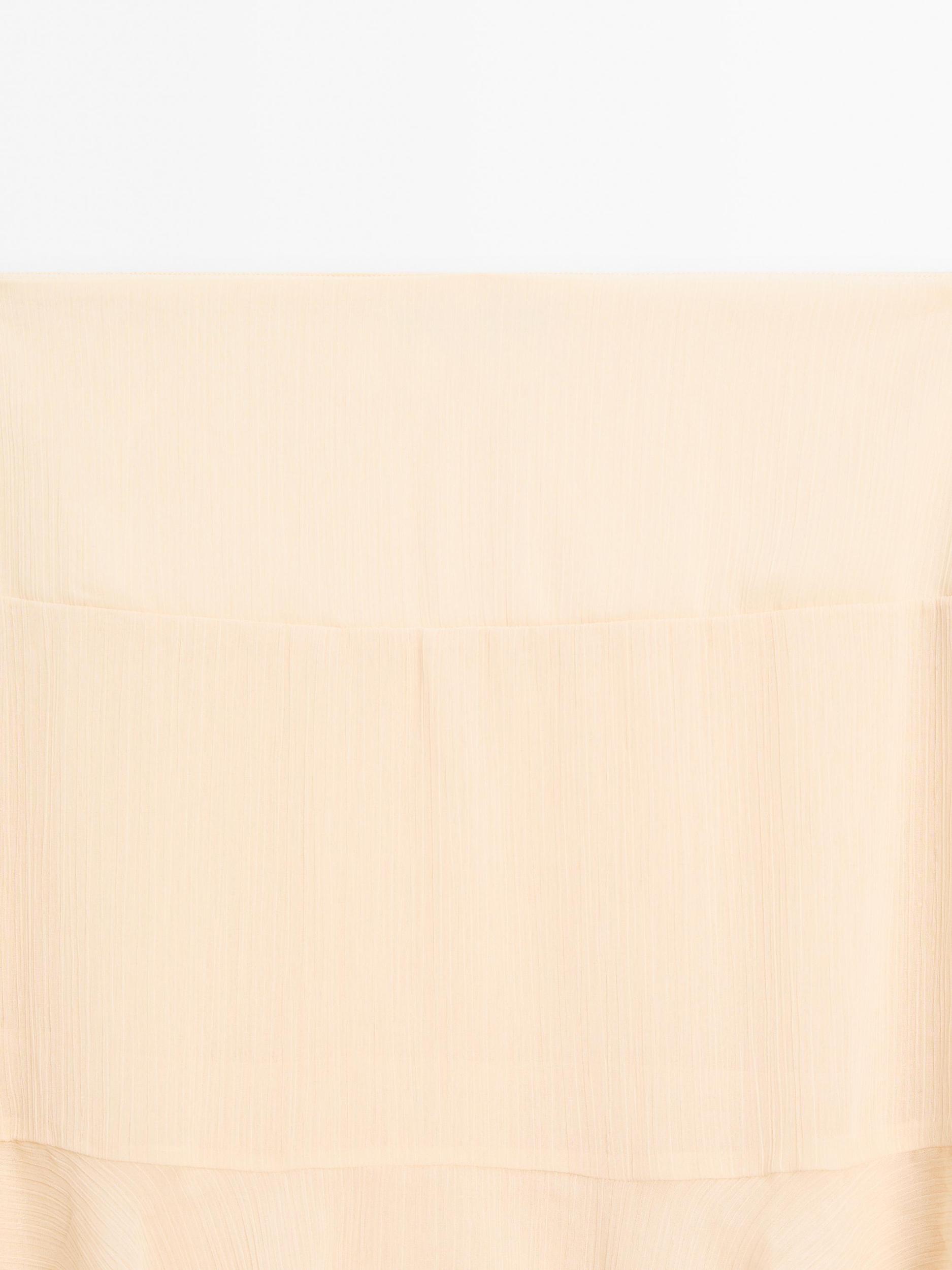 Long ruffled skirt with sash Product Image