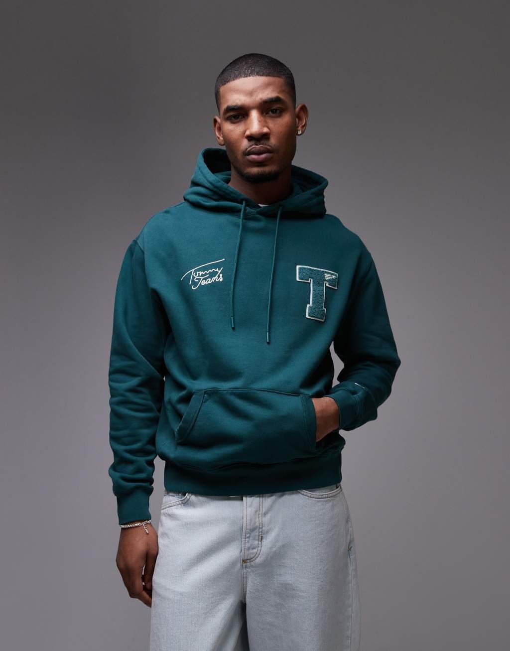 Tommy Jeans varsity patch hoodie in forest green Product Image
