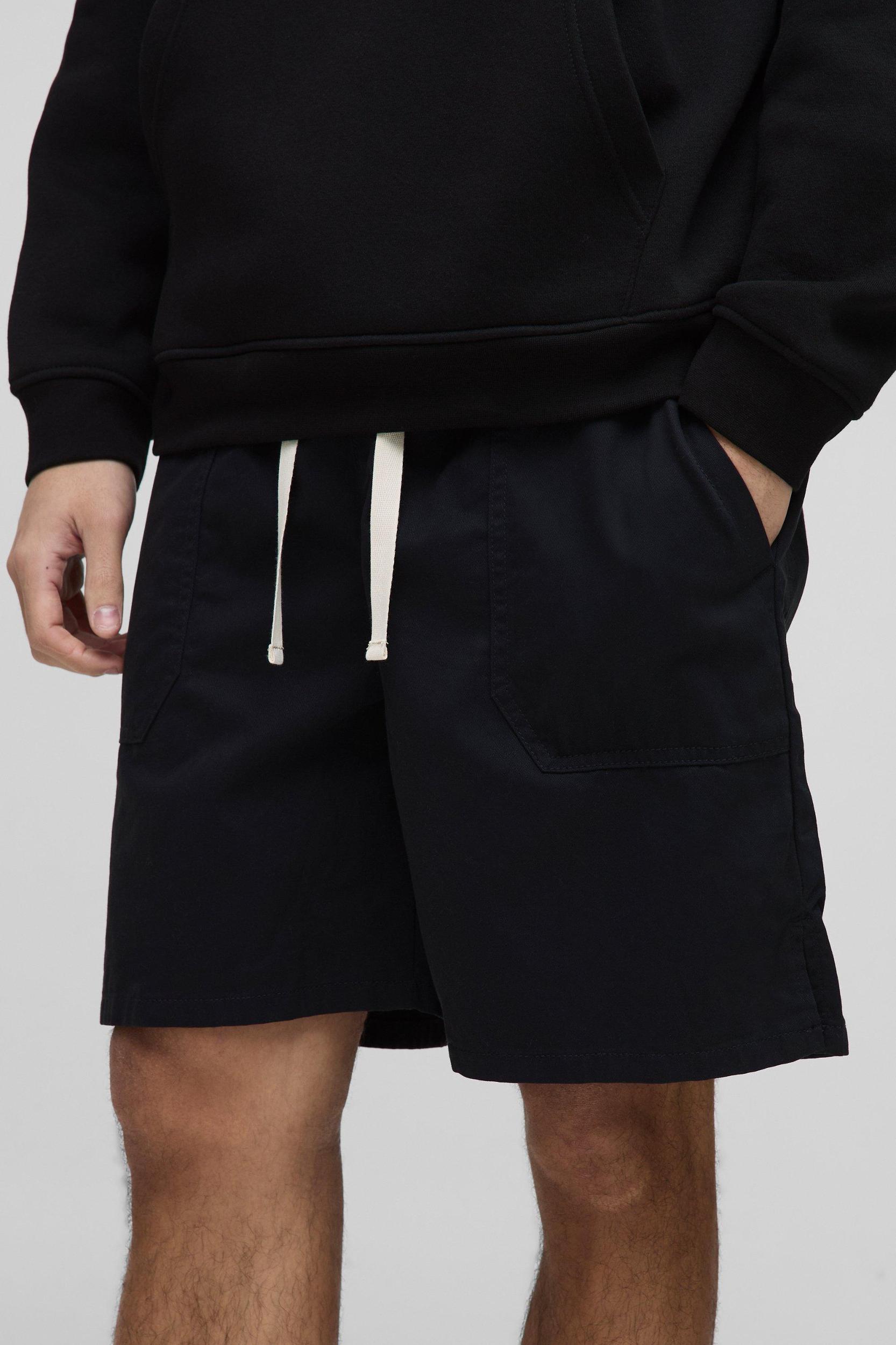 Elasticated Baggy Twill Split Hem Shorts | boohooMAN USA Product Image