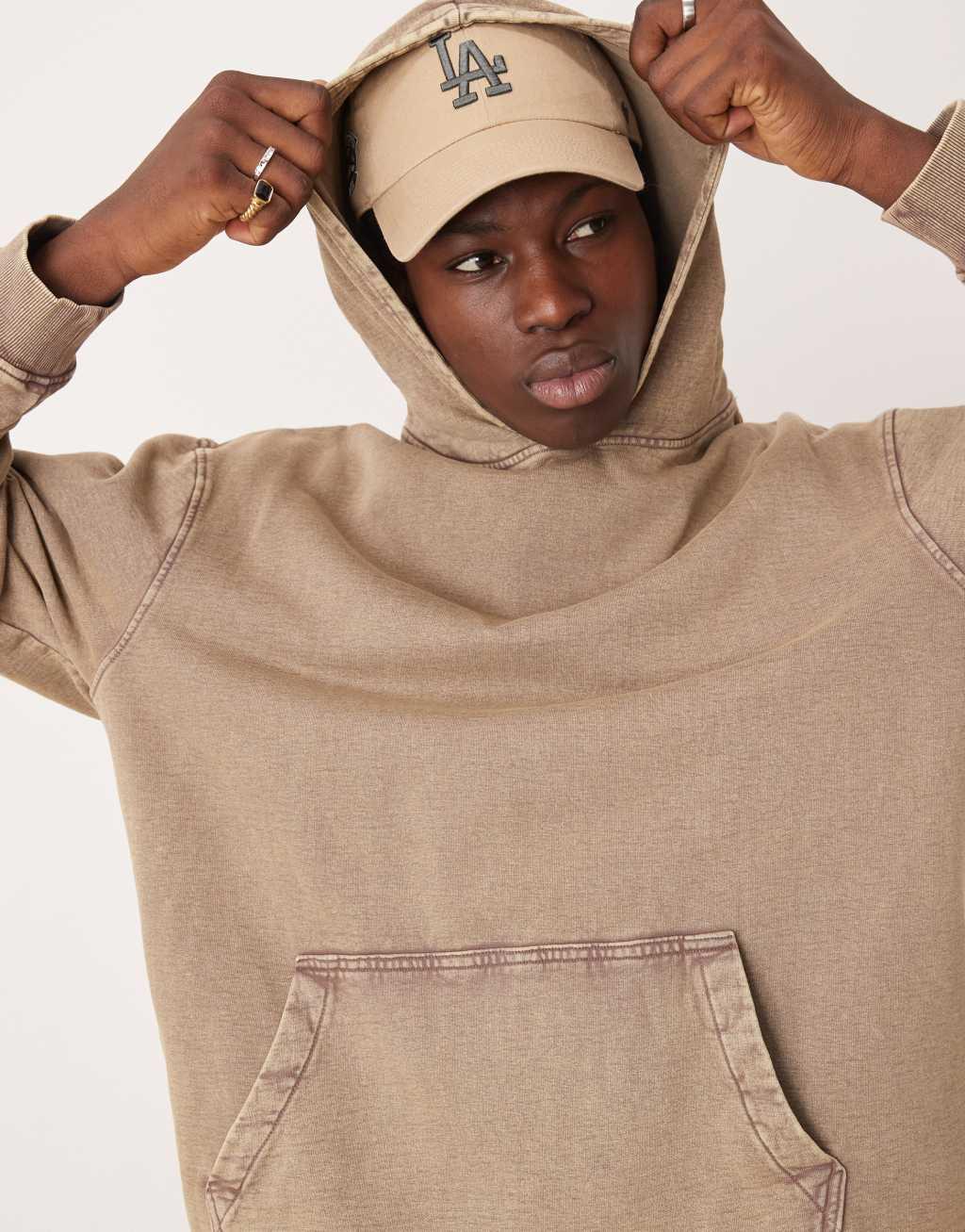 ASOS DESIGN oversized hoodie with cut and sew detail in washed brown Product Image