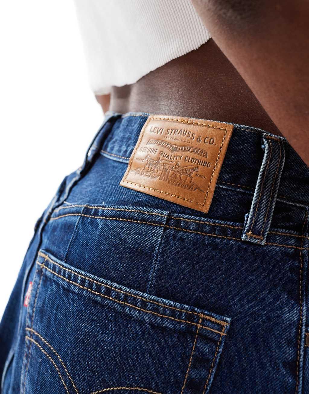 Levi's pleated denim midi skirt in dark wash blue Product Image