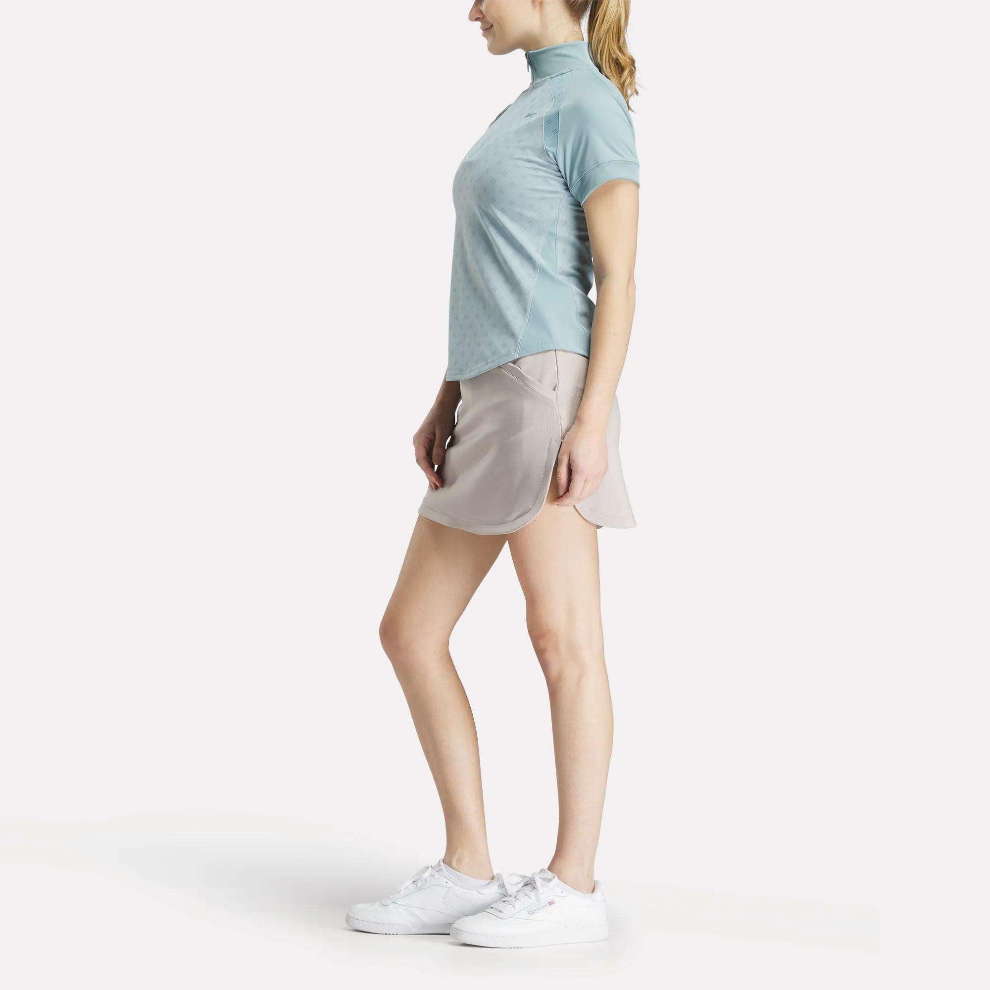 Women's Short Sleeve 1/4 Zip Mini Argyle Print Top Female Product Image