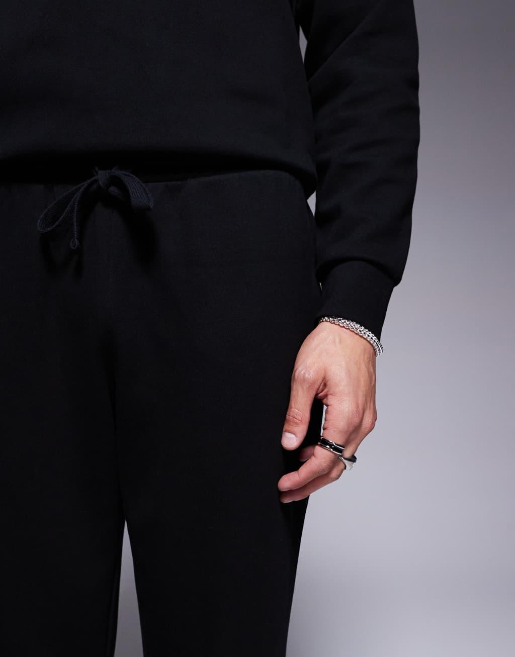 Emporio Armani Bodywear crew neck textured sweatpants in black - part of a set  Product Image