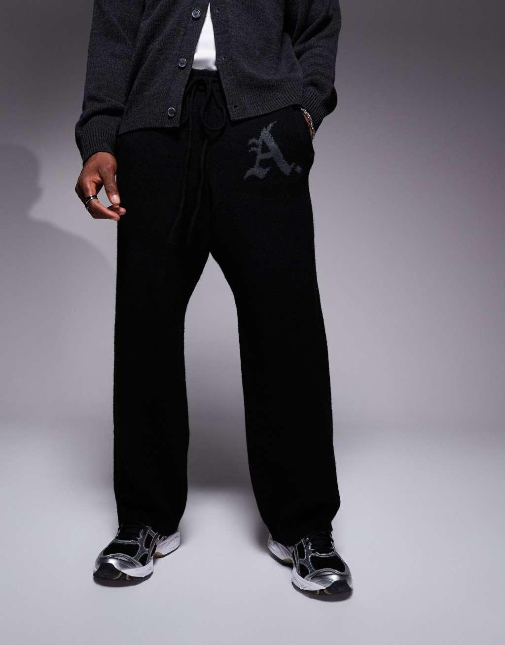 ADPT knitted loose fit sweatpants in black Product Image