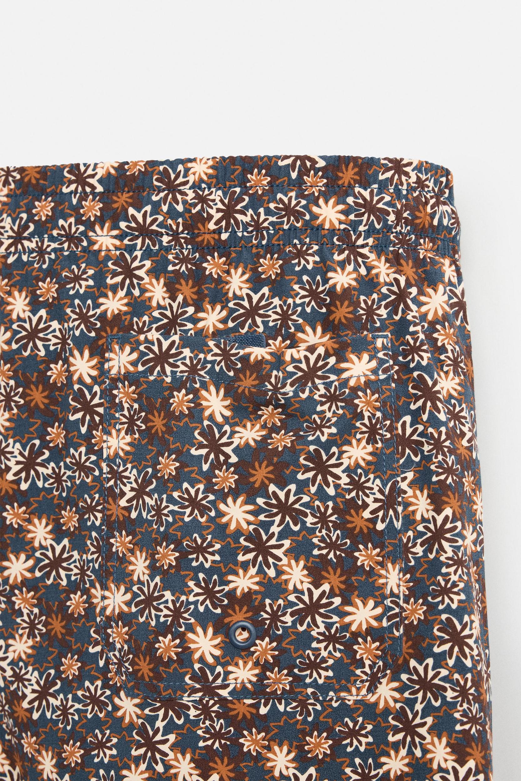 FLORAL PRINT MID-LENGTH SWIMSUIT Product Image