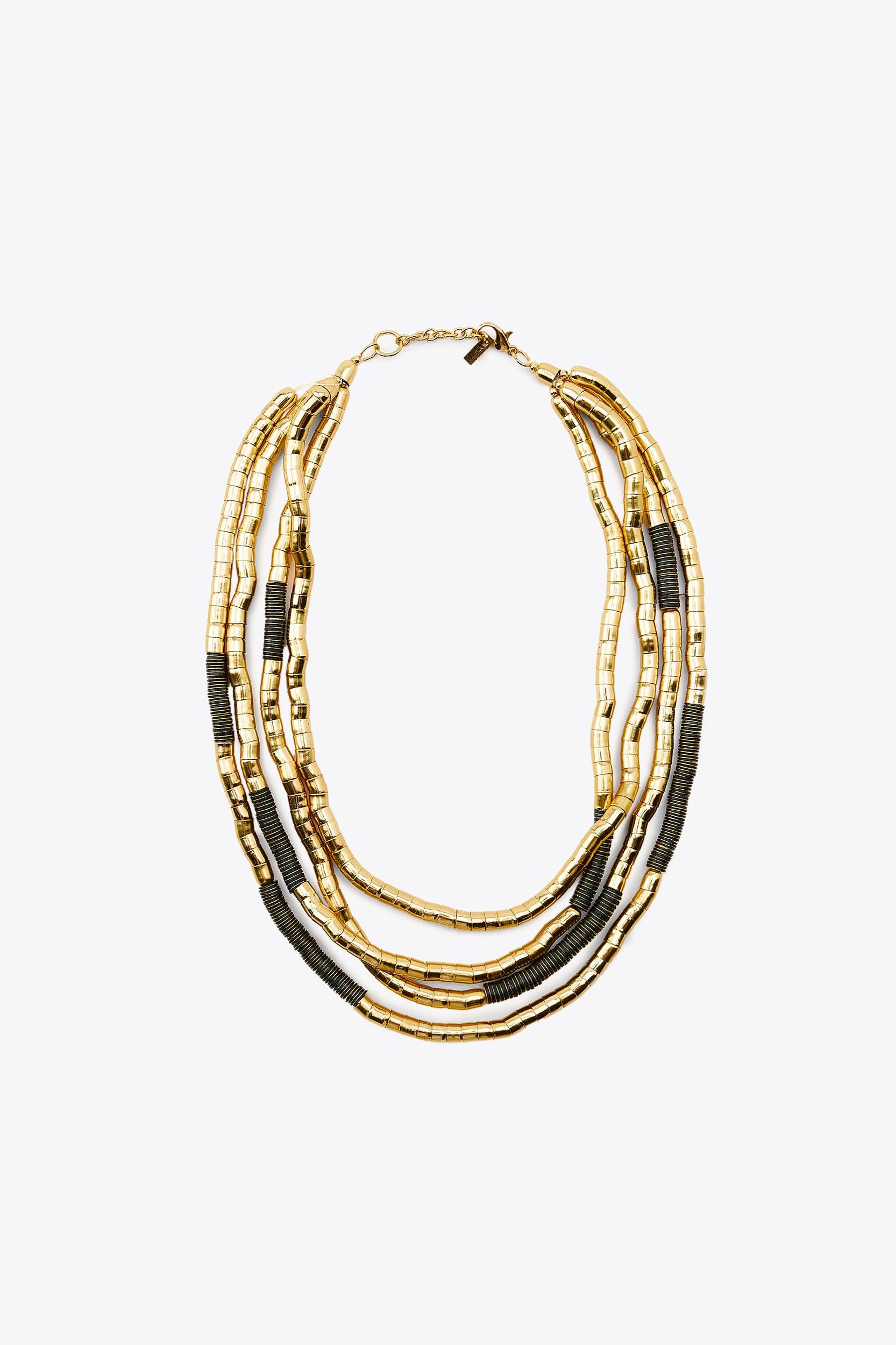NECKLACE WITH MULTIPLE COMBINED PIECES Product Image