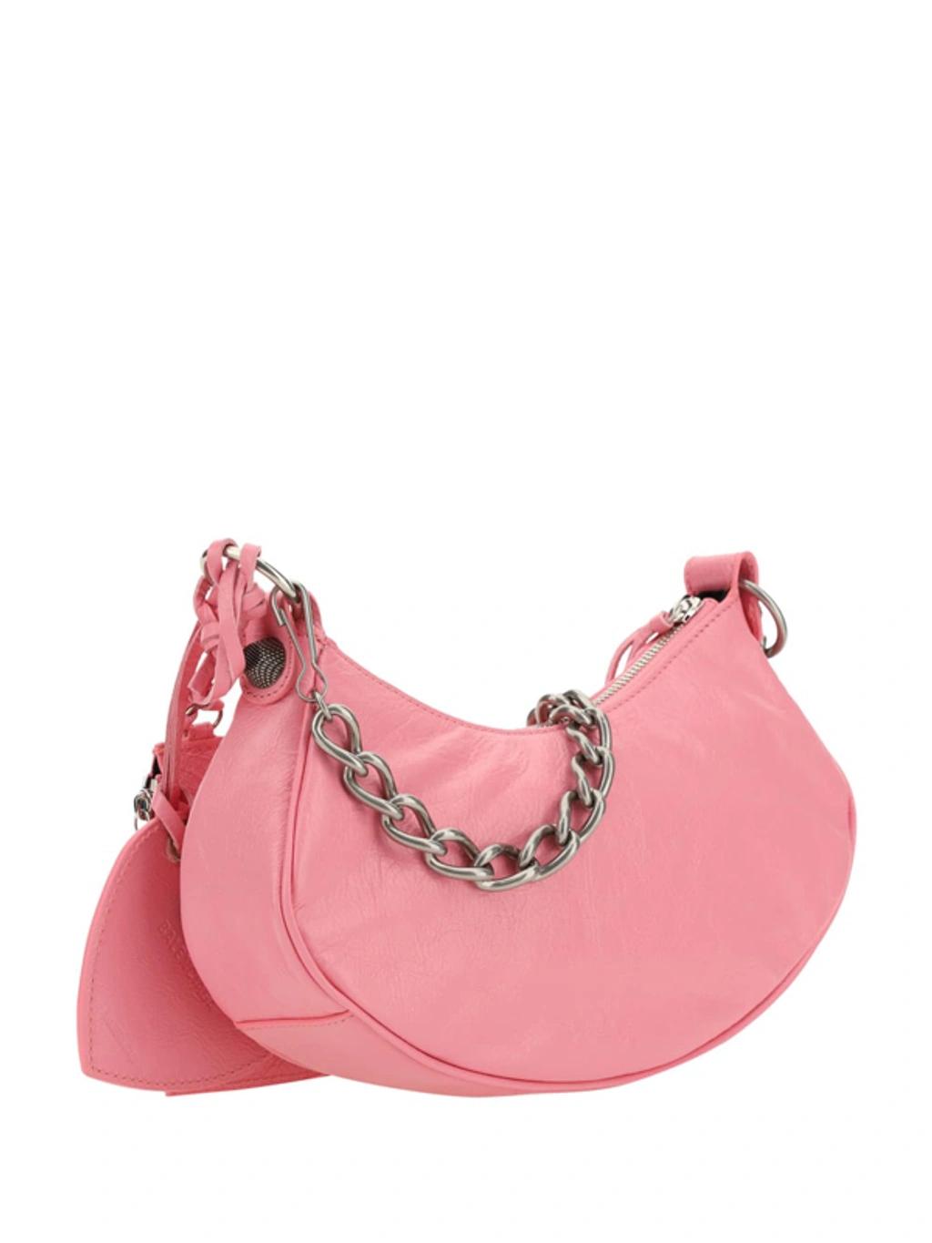 BALENCIAGA Women Pink Nappa Leather Le Cagole Xs Crossbody Bag Product Image