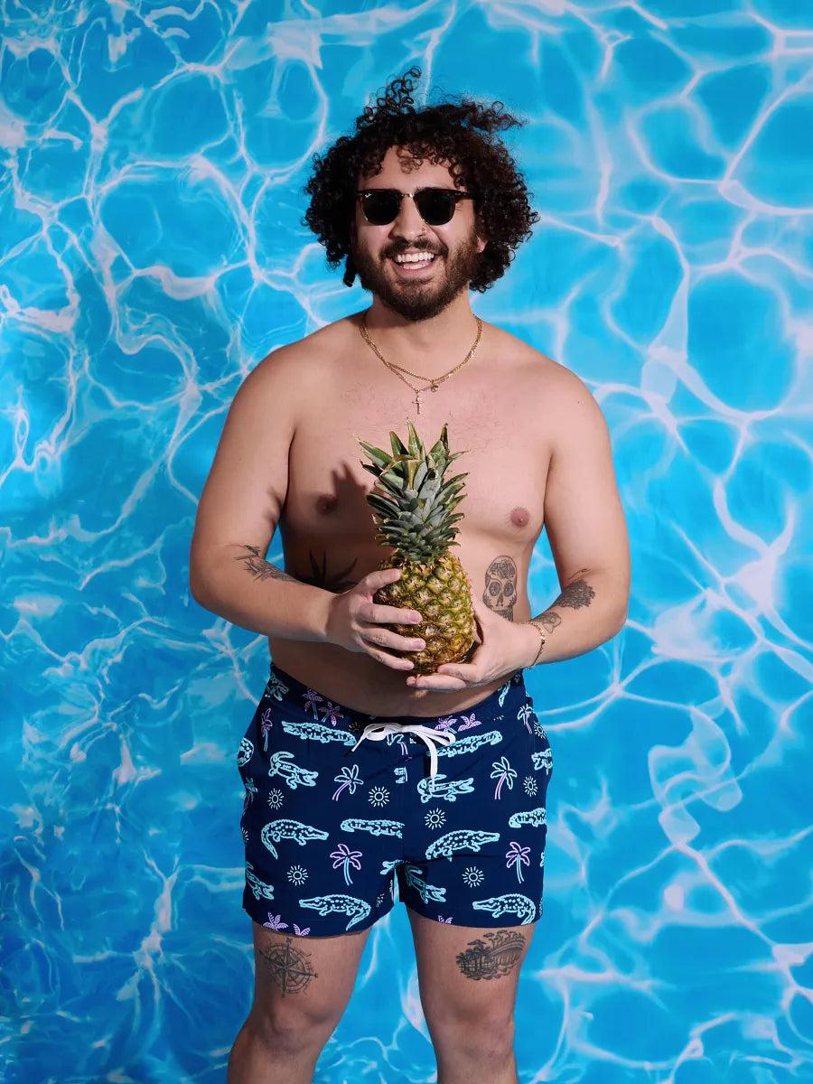 Chubbies The Neon Glades 5.5" Inseam Polyester/Spandex Swim Trunks with Mesh Brief Liner in Navy Blue Product Image