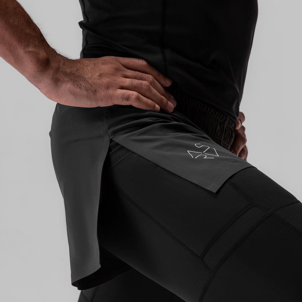 0911. Tetra-Lite® 2-in-1 High Split Legging Short - Black "Cyber"/Black Male Product Image