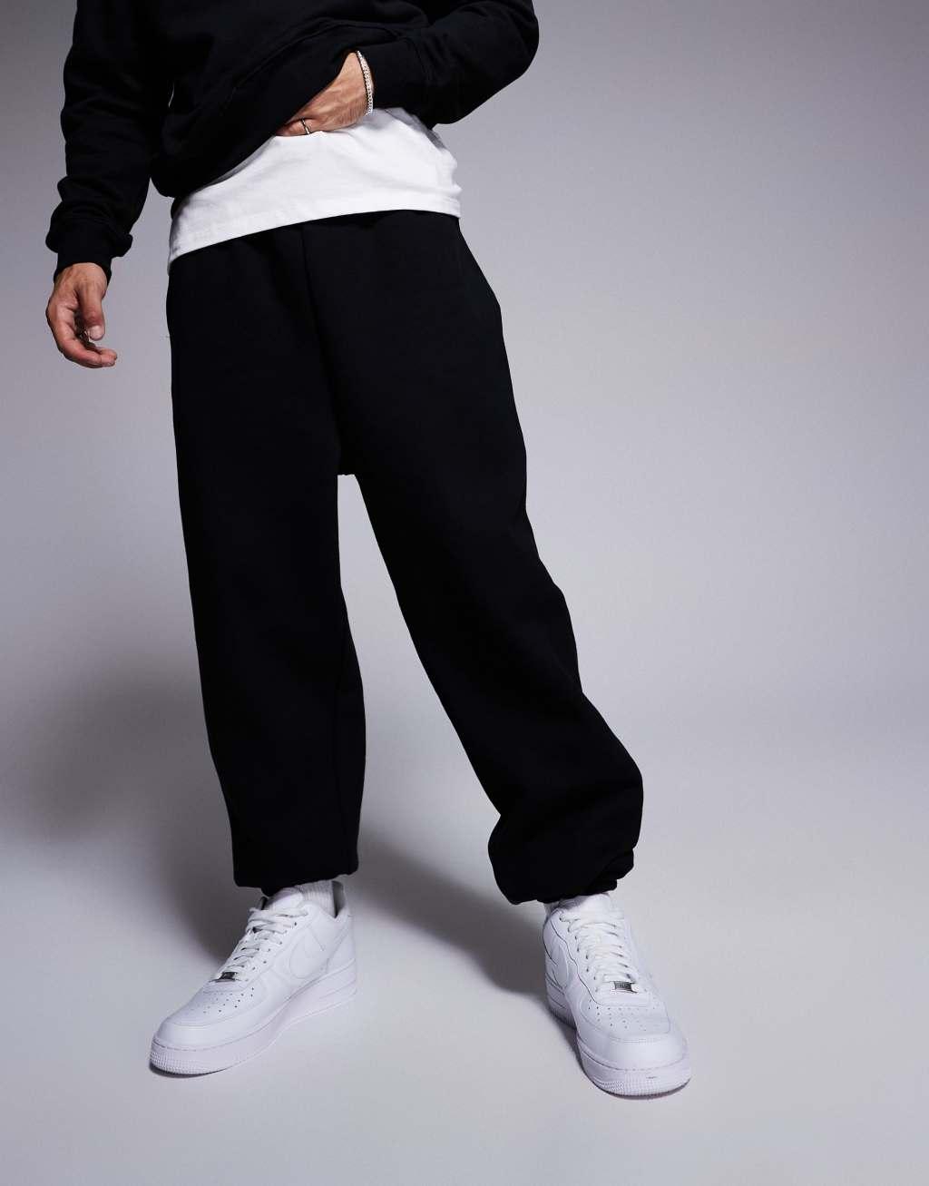 ASOS DESIGN premium heavyweight oversized sweatpants in black Product Image