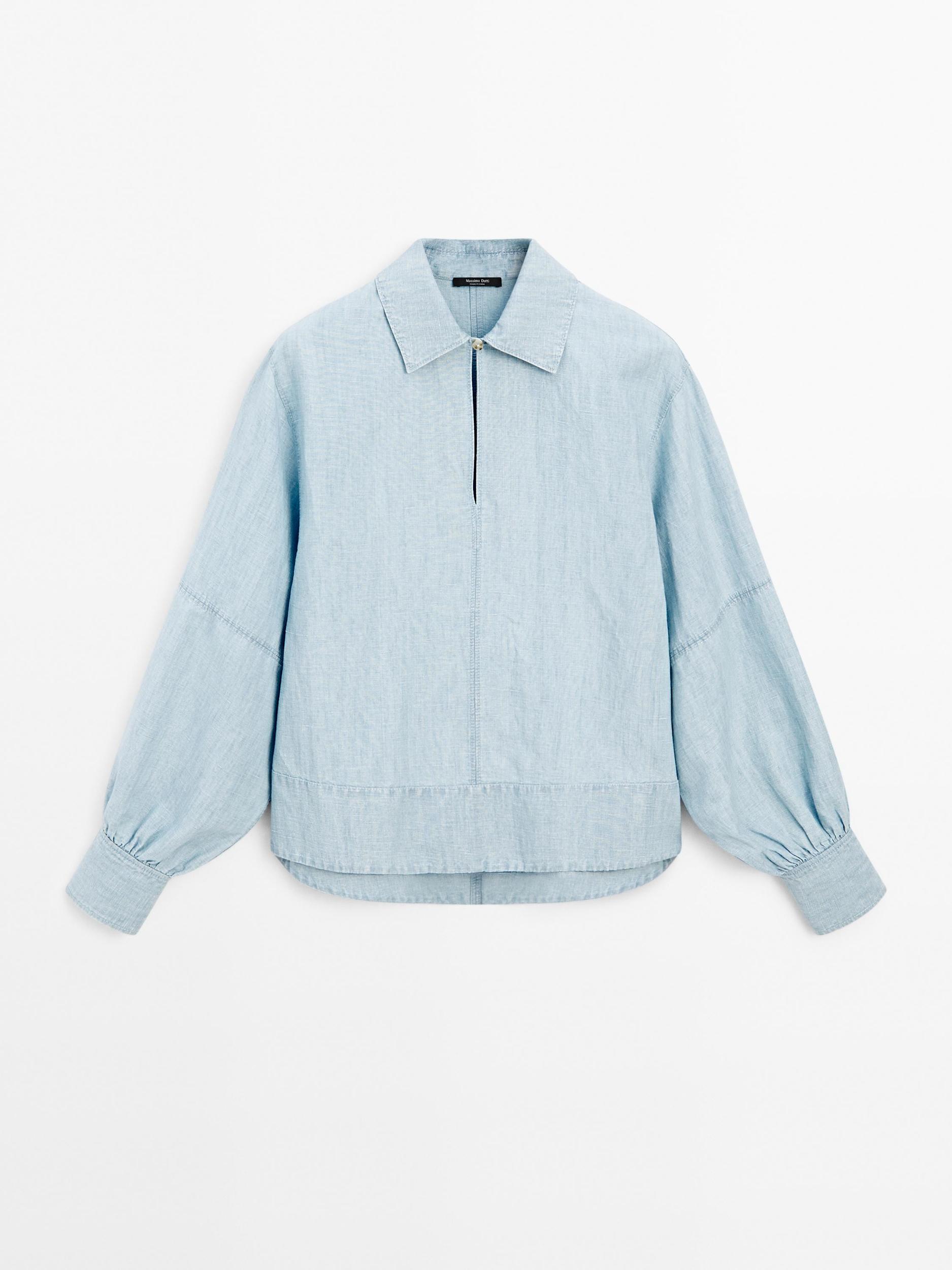 Oversize denim blouse with puff sleeves Product Image