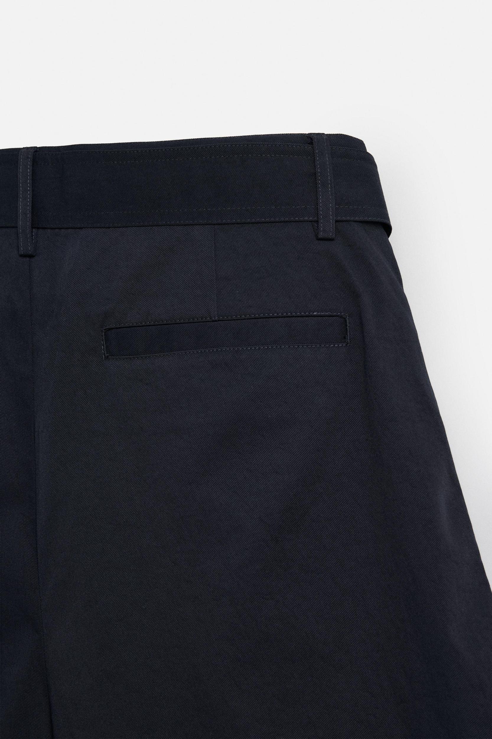 PLEATED BELT BERMUDA SHORTS Product Image