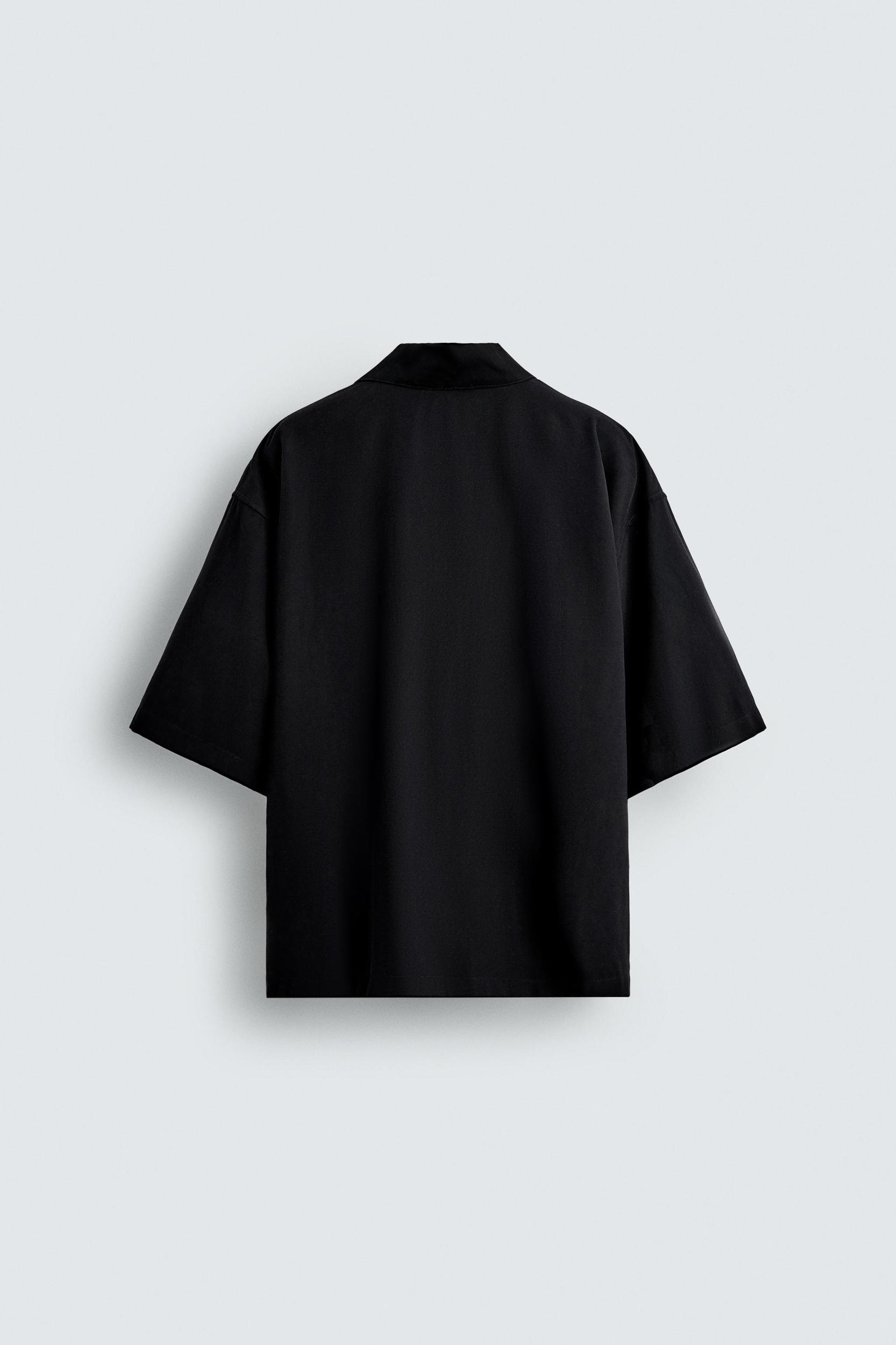 FLOWY SHIRT WITH EMBROIDERED TEXT Product Image