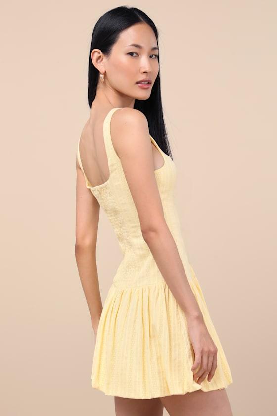 Khamari Yellow Textured Drop Waist Bubble-Hem Mini Dress Product Image