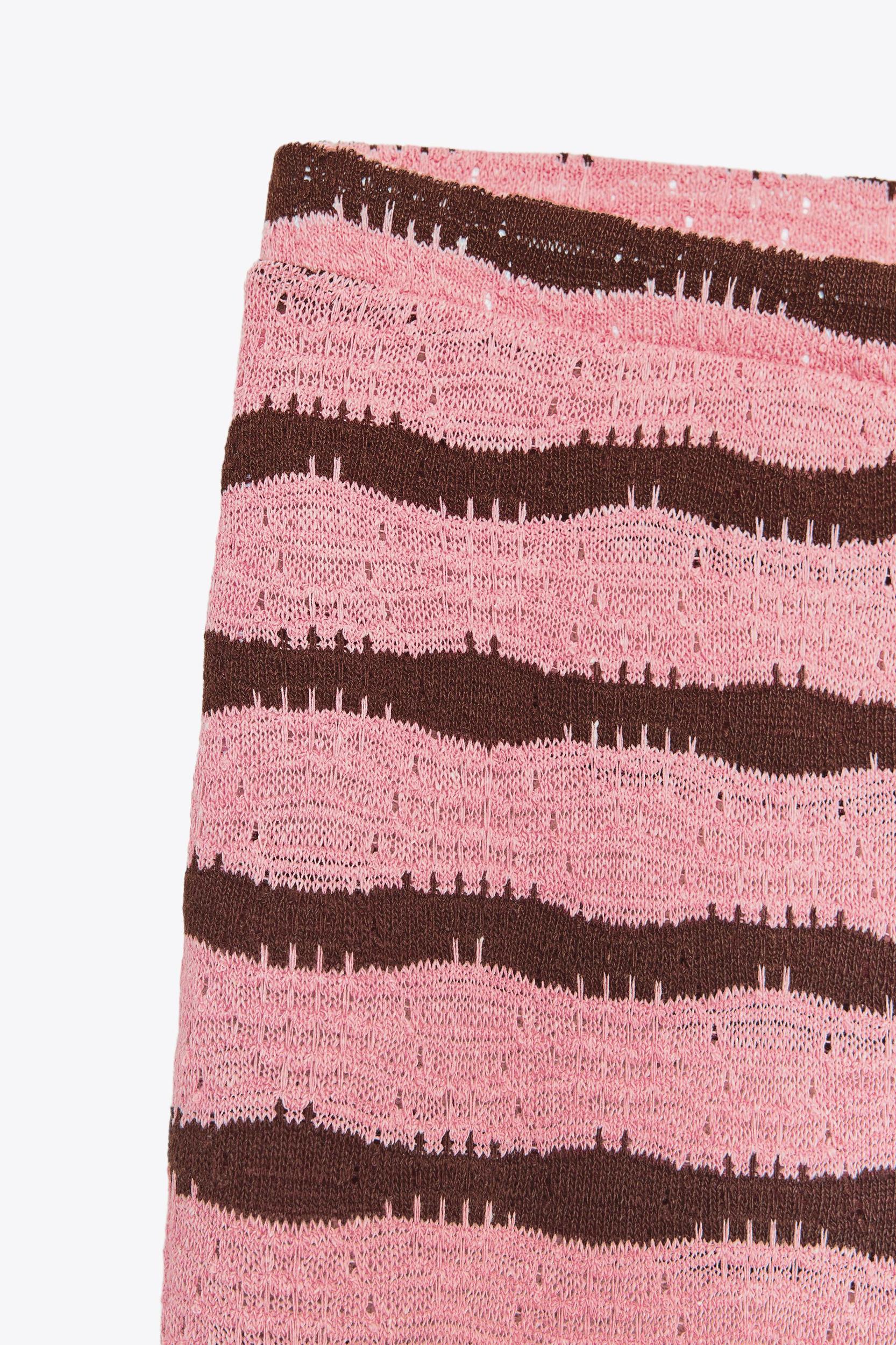 CUT-OUT STRIPED KNIT FLARE PANTS Product Image