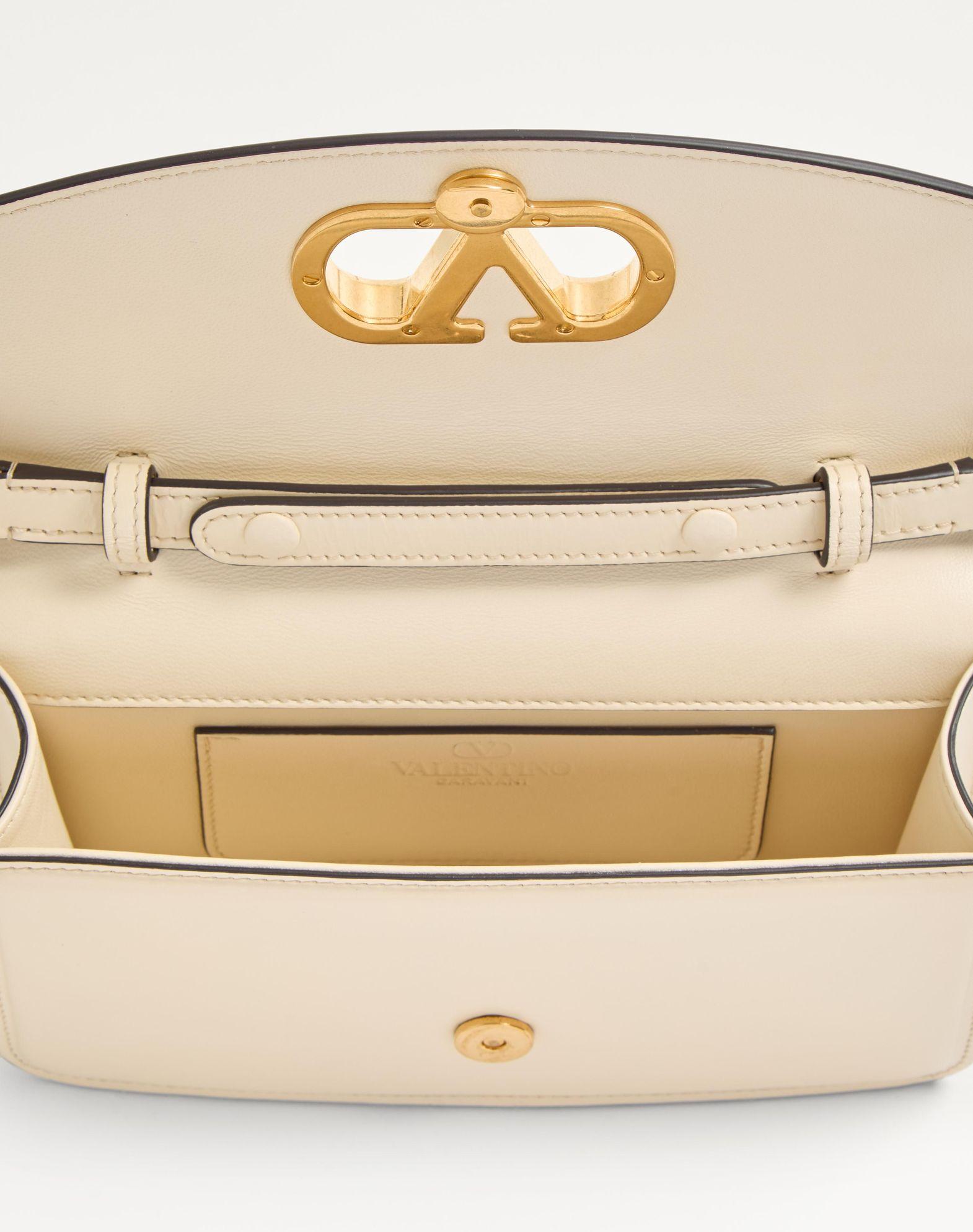 Valentino Garavani Vain Clutch Bag In Shiny Calfskin Product Image