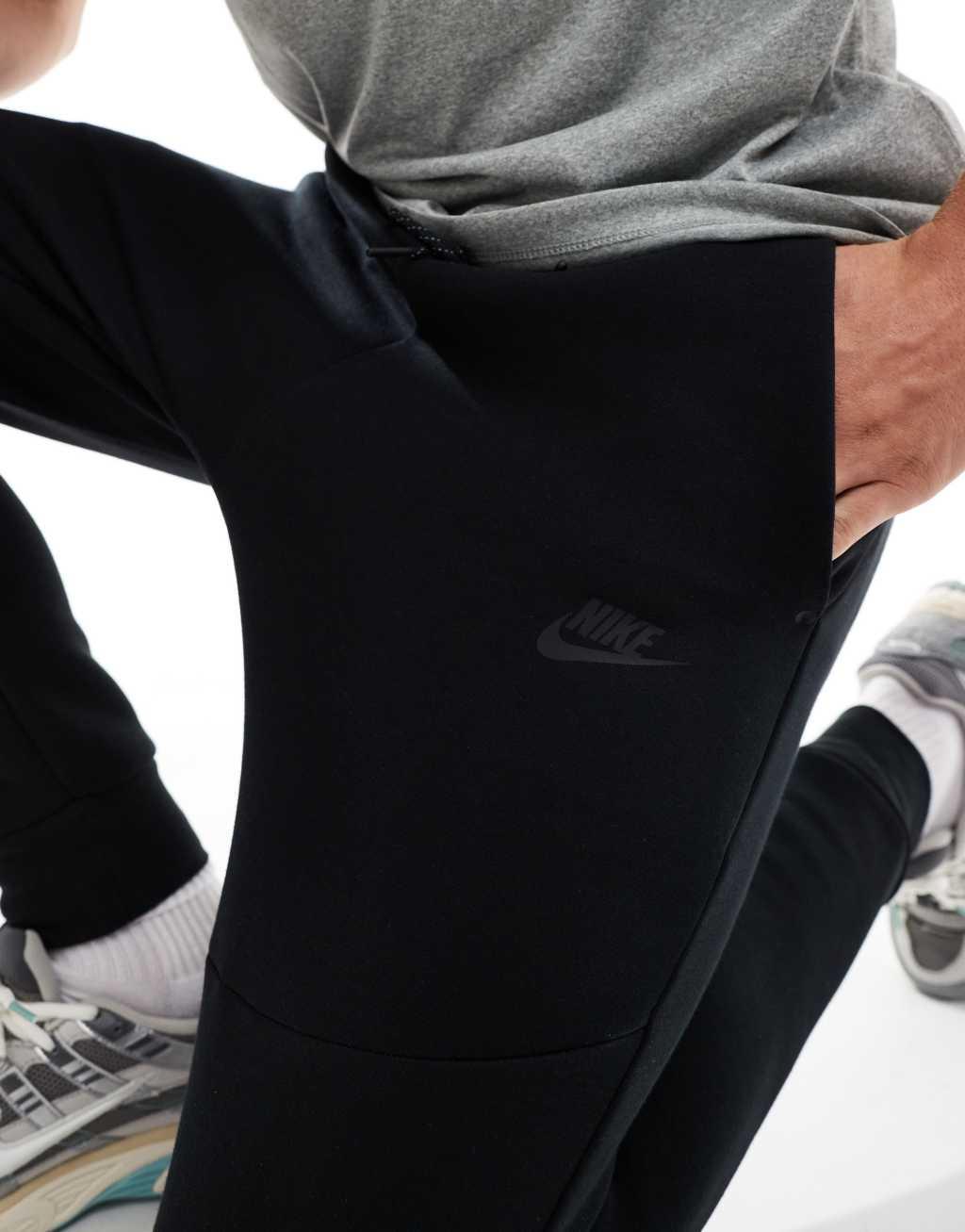 Nike Tech Fleece cuffed joggers in black Product Image