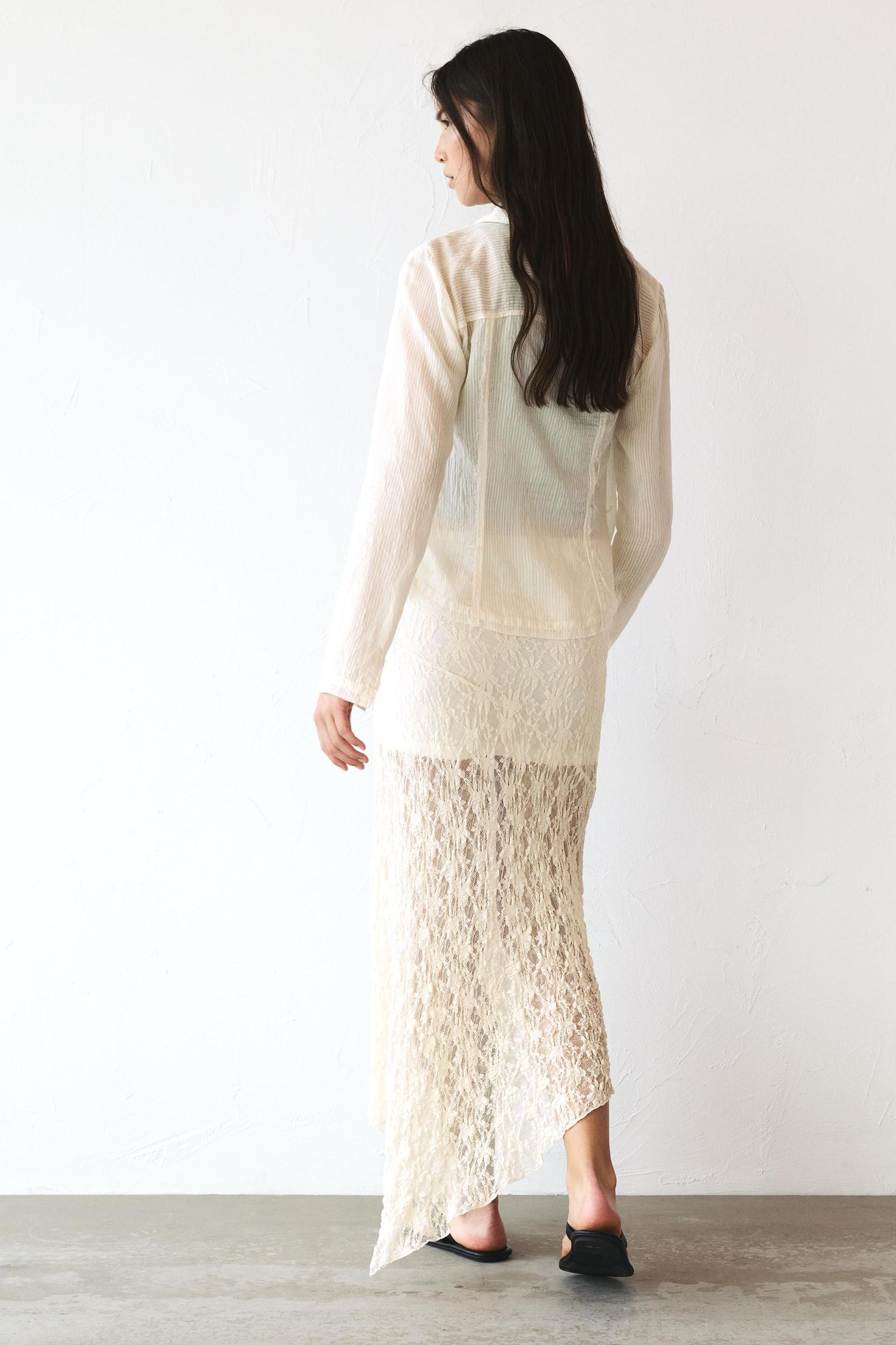 Asymmetric lace midi skirt Product Image
