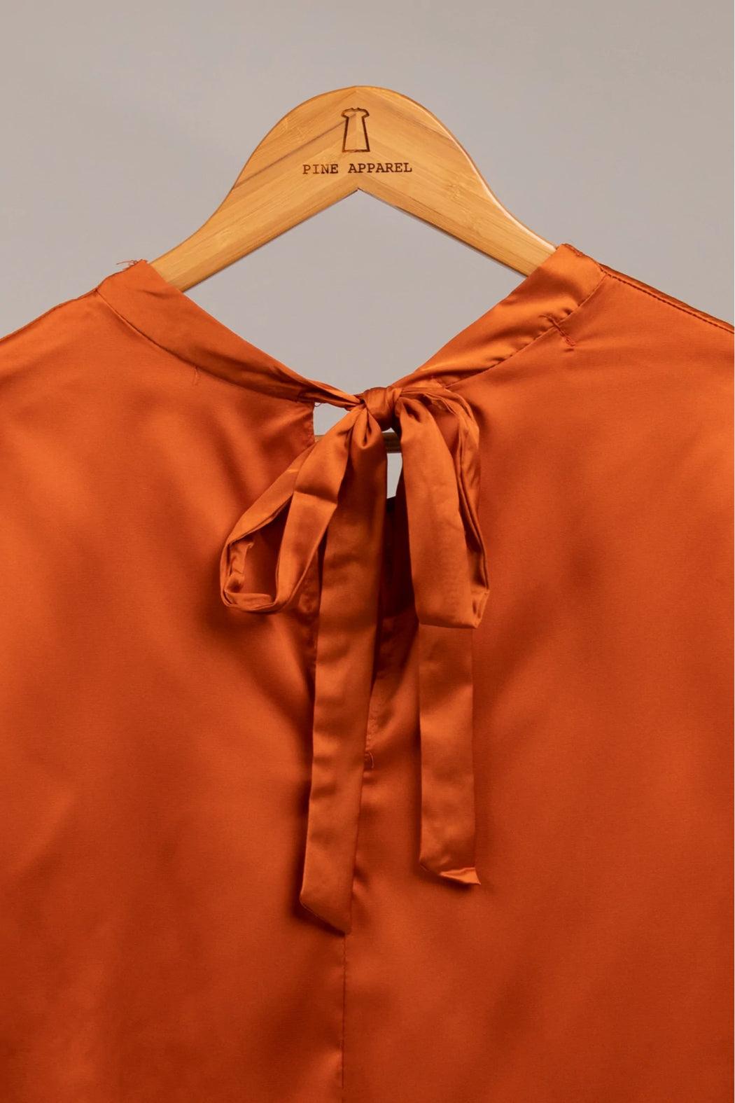 Sleeveless satin top with tie detail Product Image