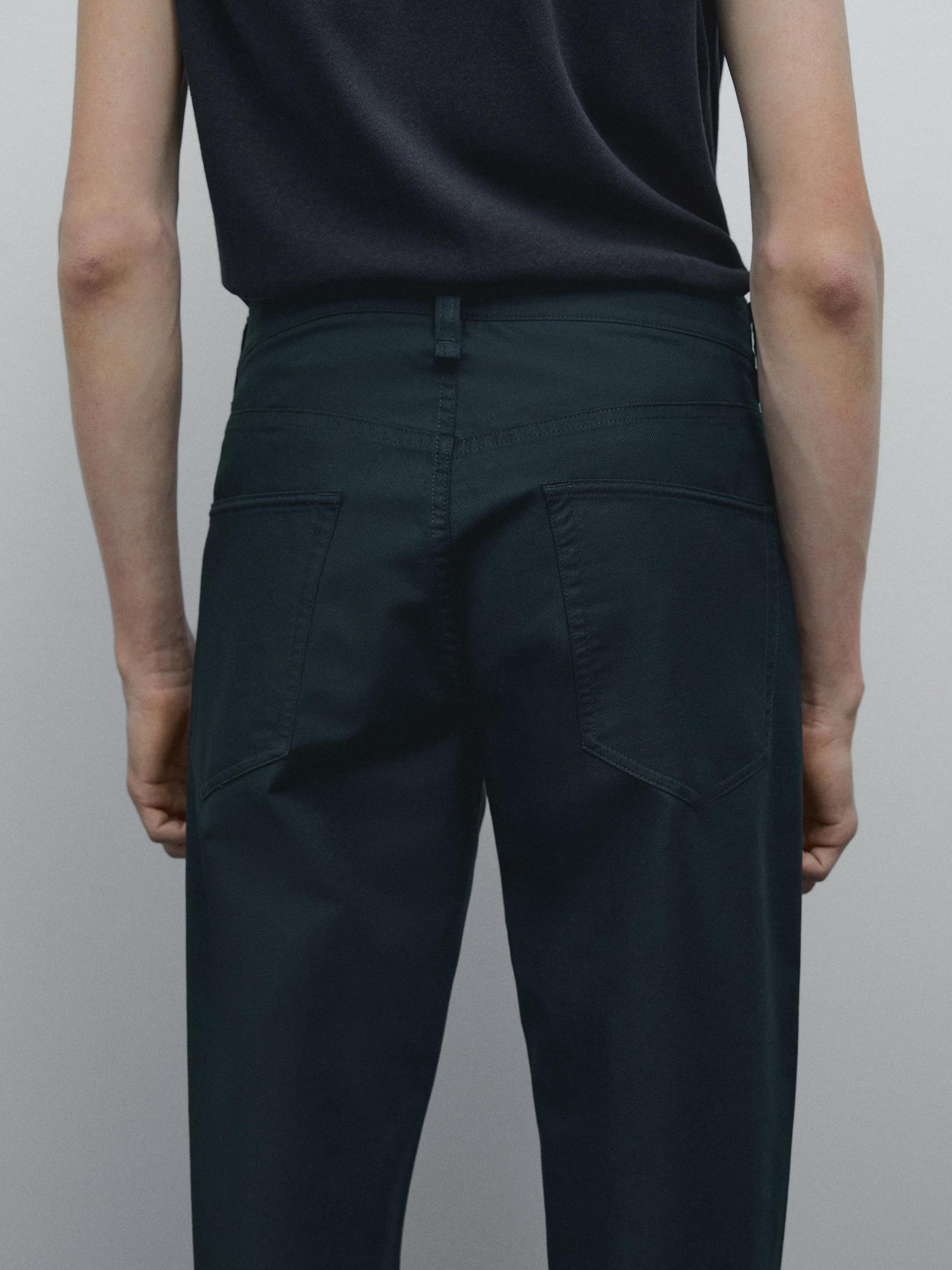 Lightweight tapered fit denim-effect trousers Product Image