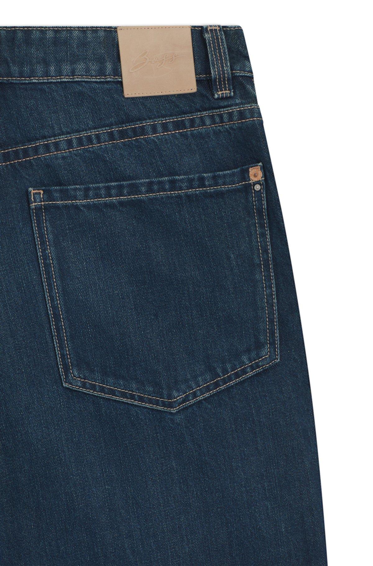 Wide-leg jeans with front pleats Product Image