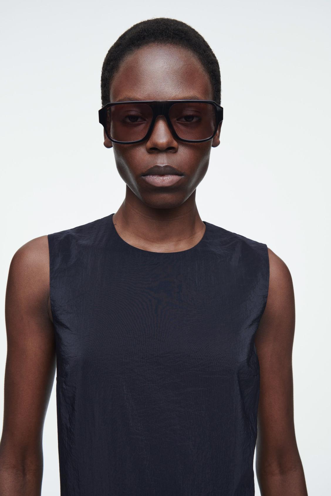 SLEEVELESS BUBBLE-HEM MIDI DRESS Product Image