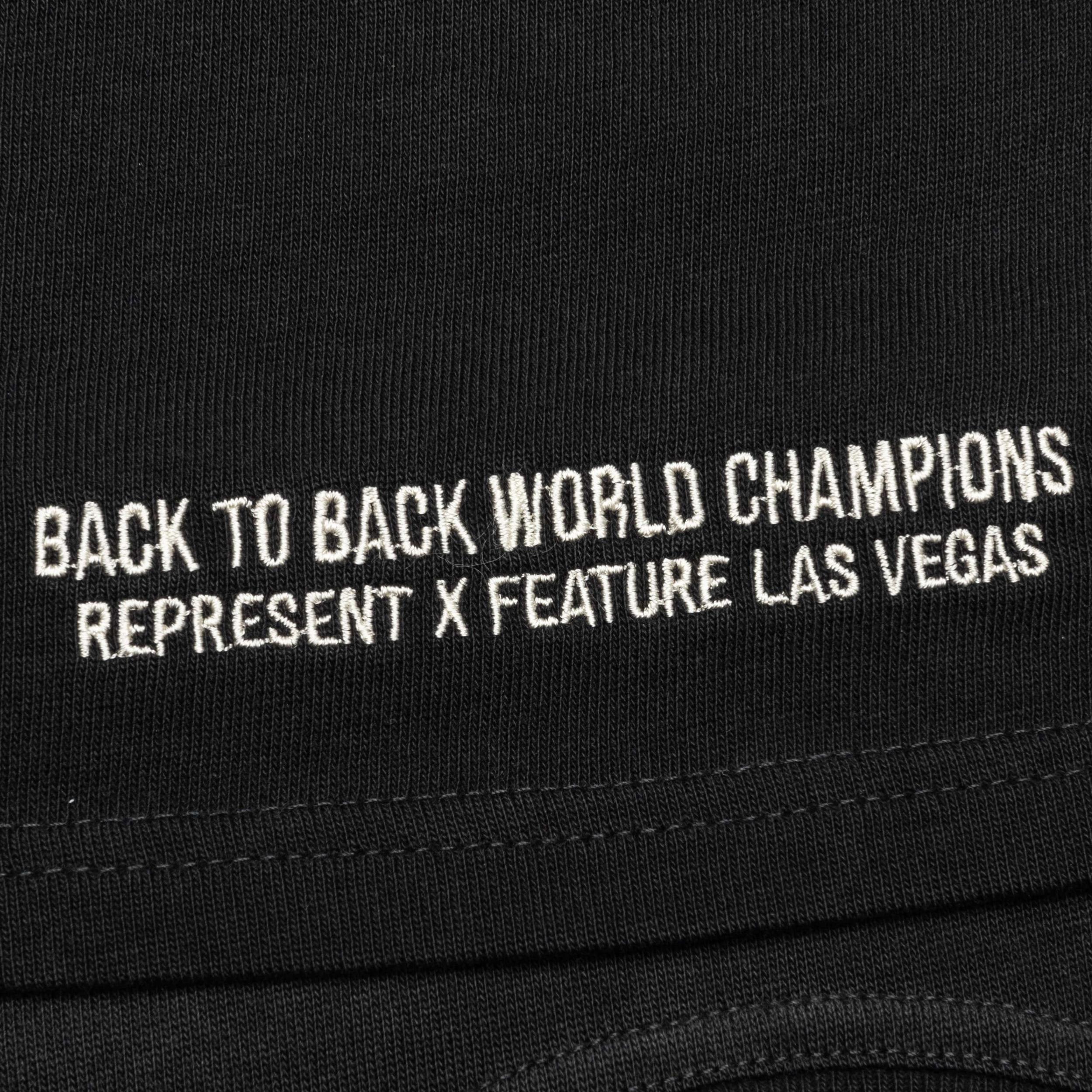 Feature x Represent Champions T-Shirt - Stained Black Male Product Image