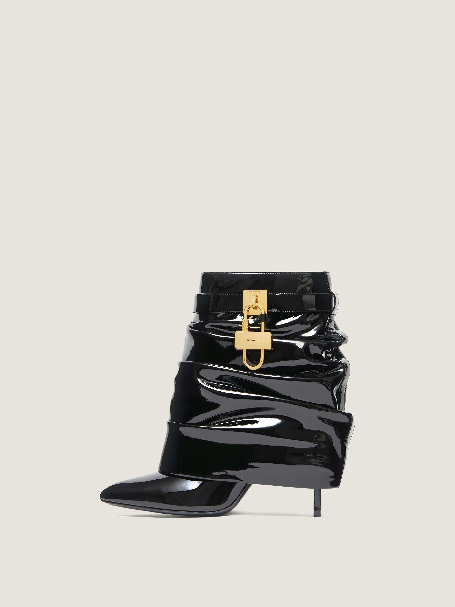 Shark Lock Stiletto ankle boots in latex Product Image