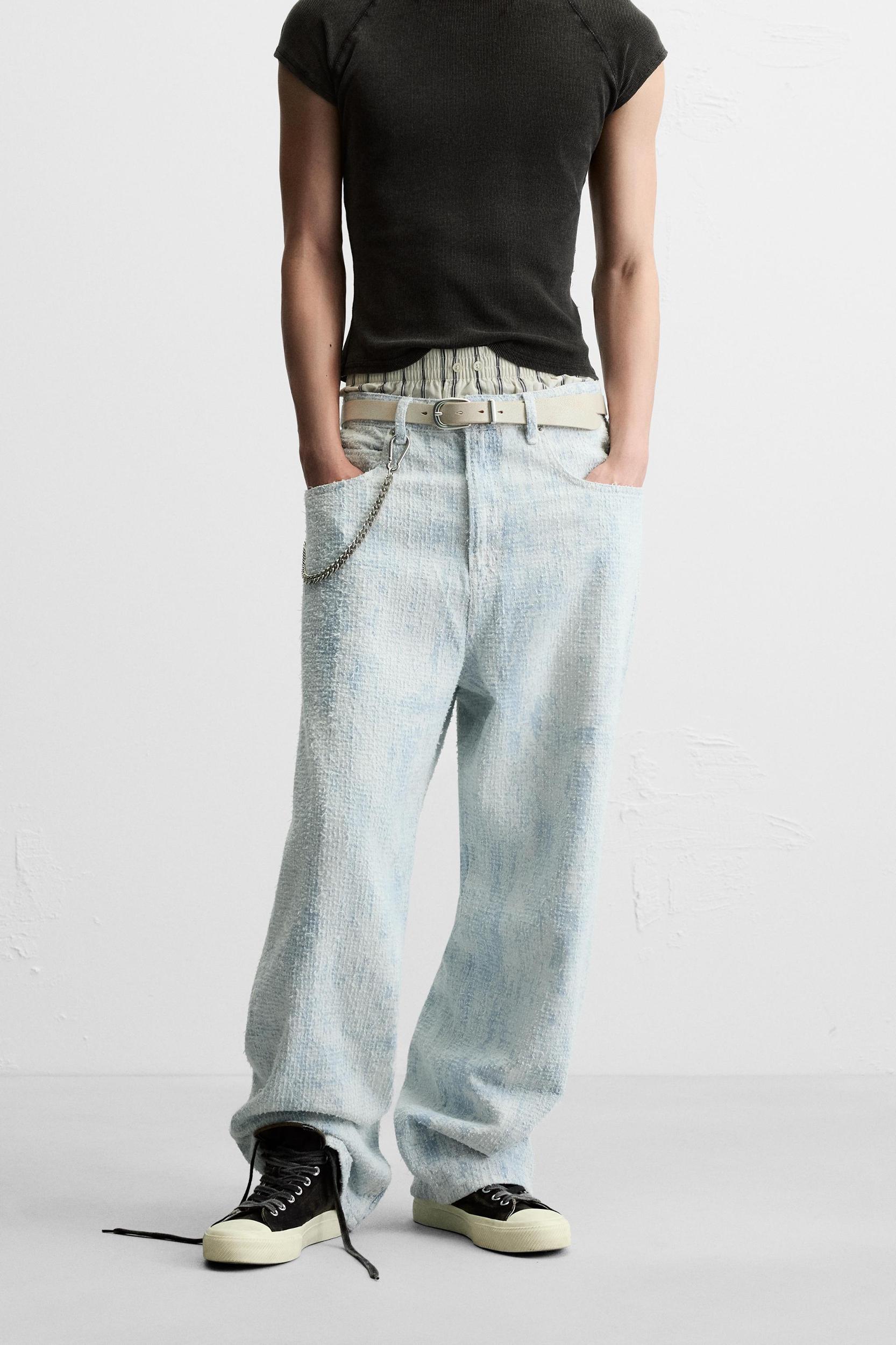 DISTRESSED FINISH BAGGY FIT JEANS Product Image