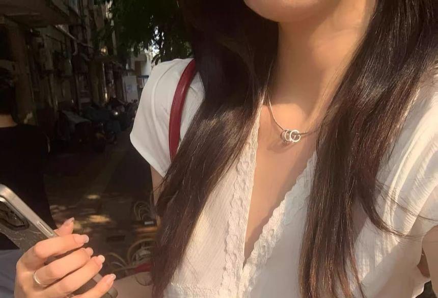 Short Sleeve V-Neck Plain Lace Panel Ruffled Hem Slim-Fit Blouse Product Image