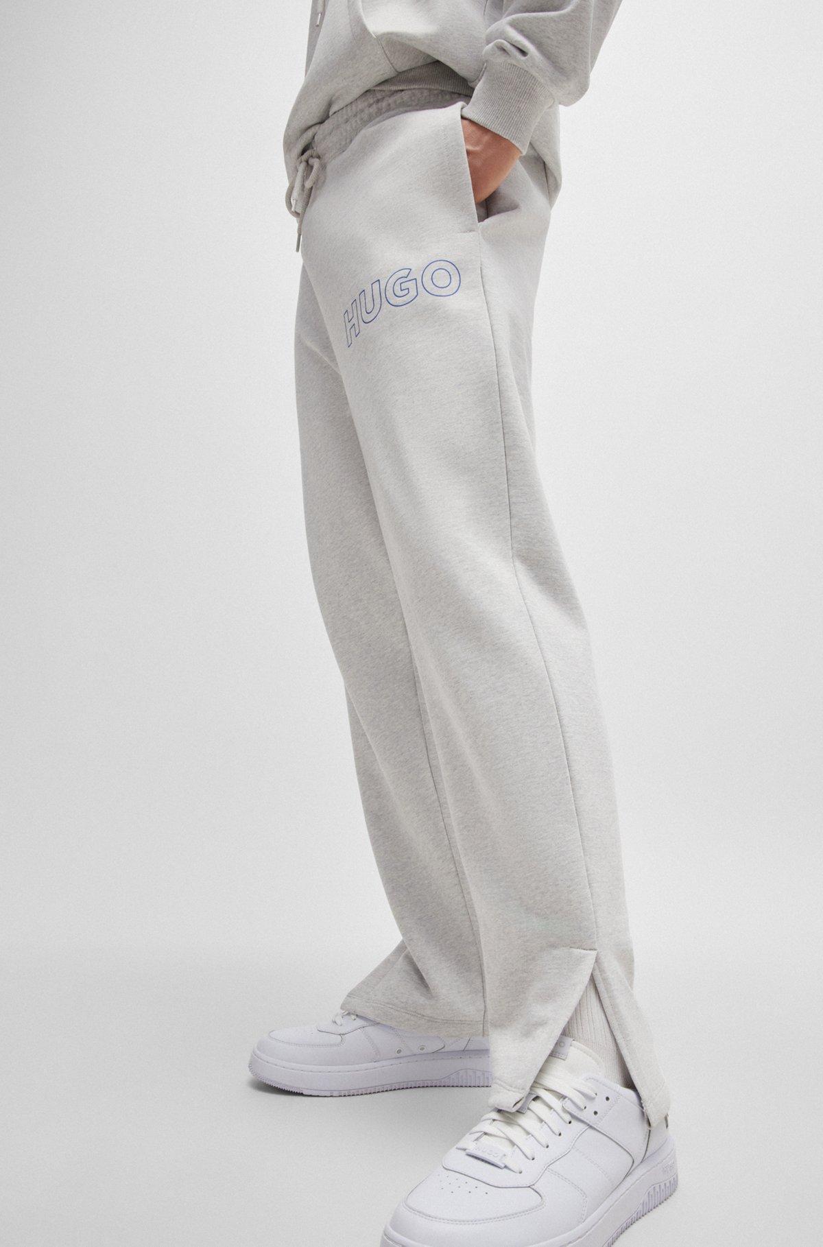 Loose-fit cotton-terry tracksuit bottoms with outline logo Product Image