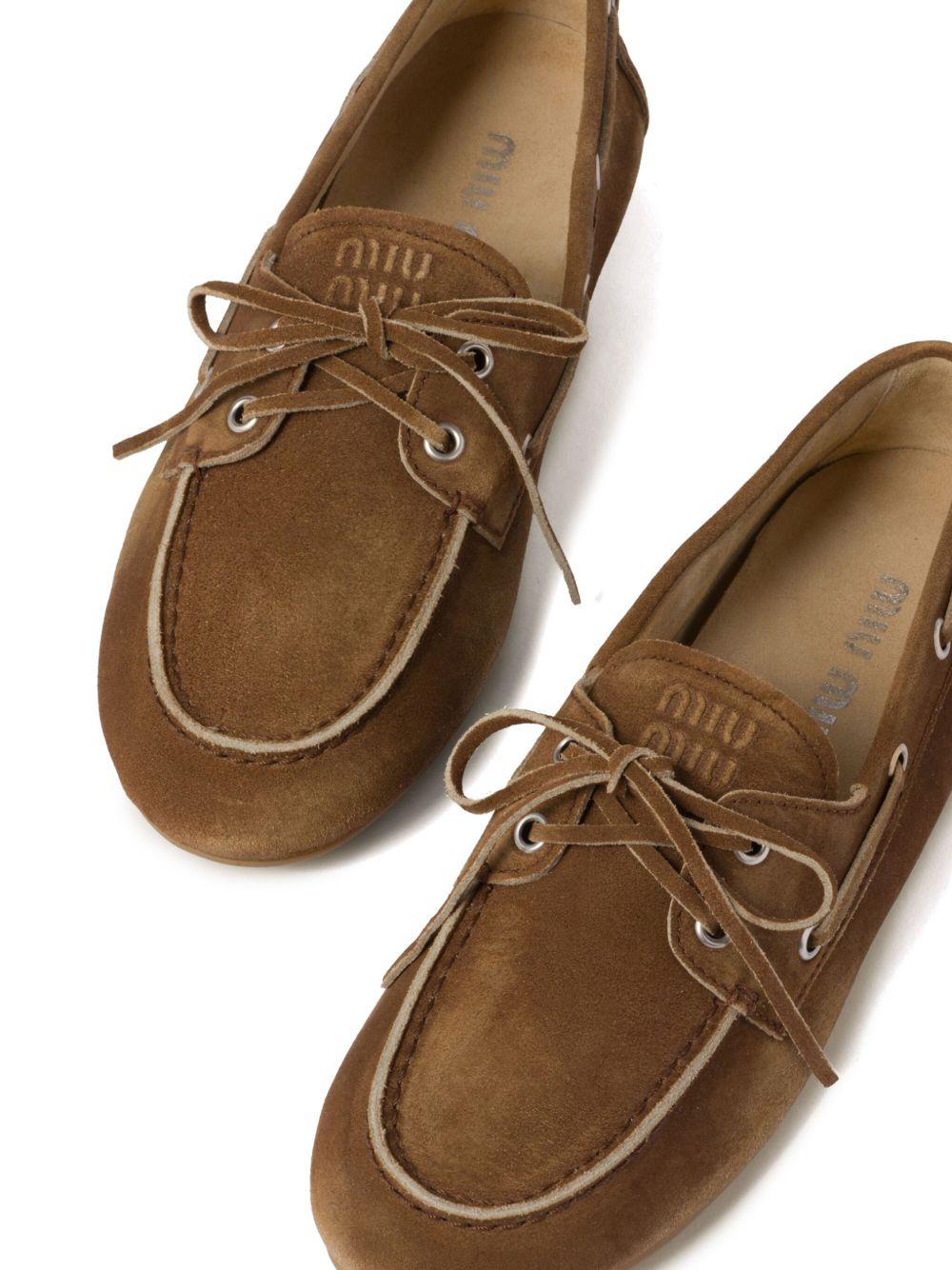 logo-embossed suede loafers Product Image