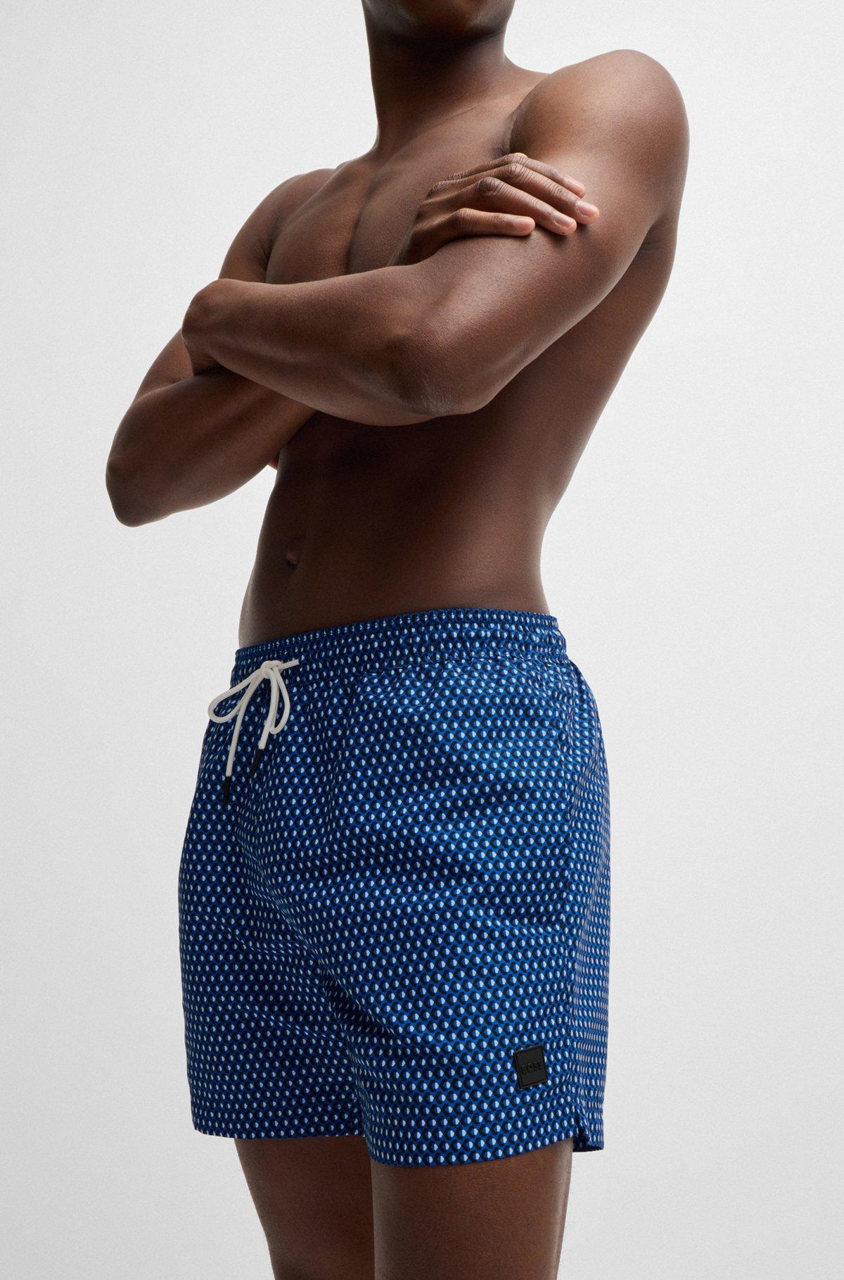 BOSS - Drawstring-waist swim shorts with all-over print - Blue Product Image